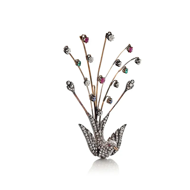 <p>Brooch with diamonds, emeralds and sapphires in silver on gold circa 19th century</p>