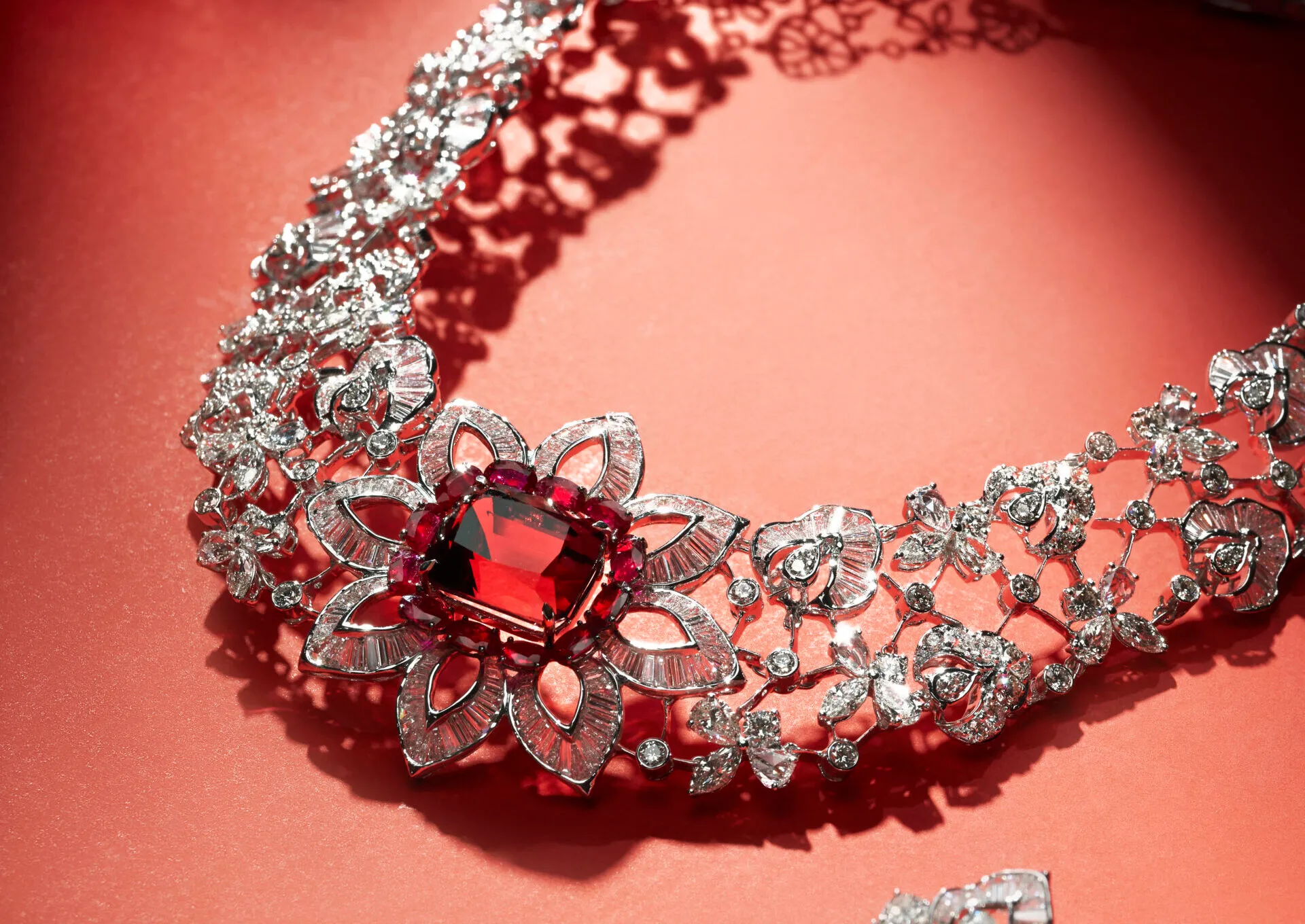 <p>Jaipur Gems Sunset Serenade necklace with a 26-carat loupe clean Afghan tourmaline surrounded by rubies and diamonds in a floral motif   </p>
