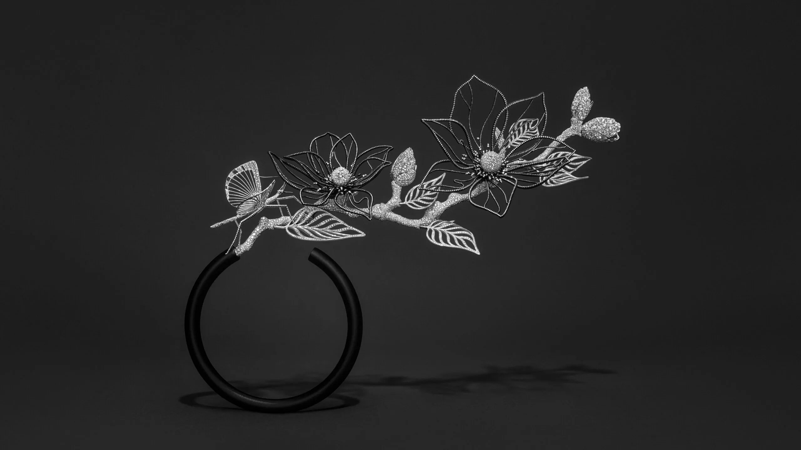 <p>Composition No.2 of the Boucheron Impermanence High Jewellery collection, incorporating the Magnolia transformable head jewel-collar necklace and the Stick Insect brooch in a matte-black composite vase</p>