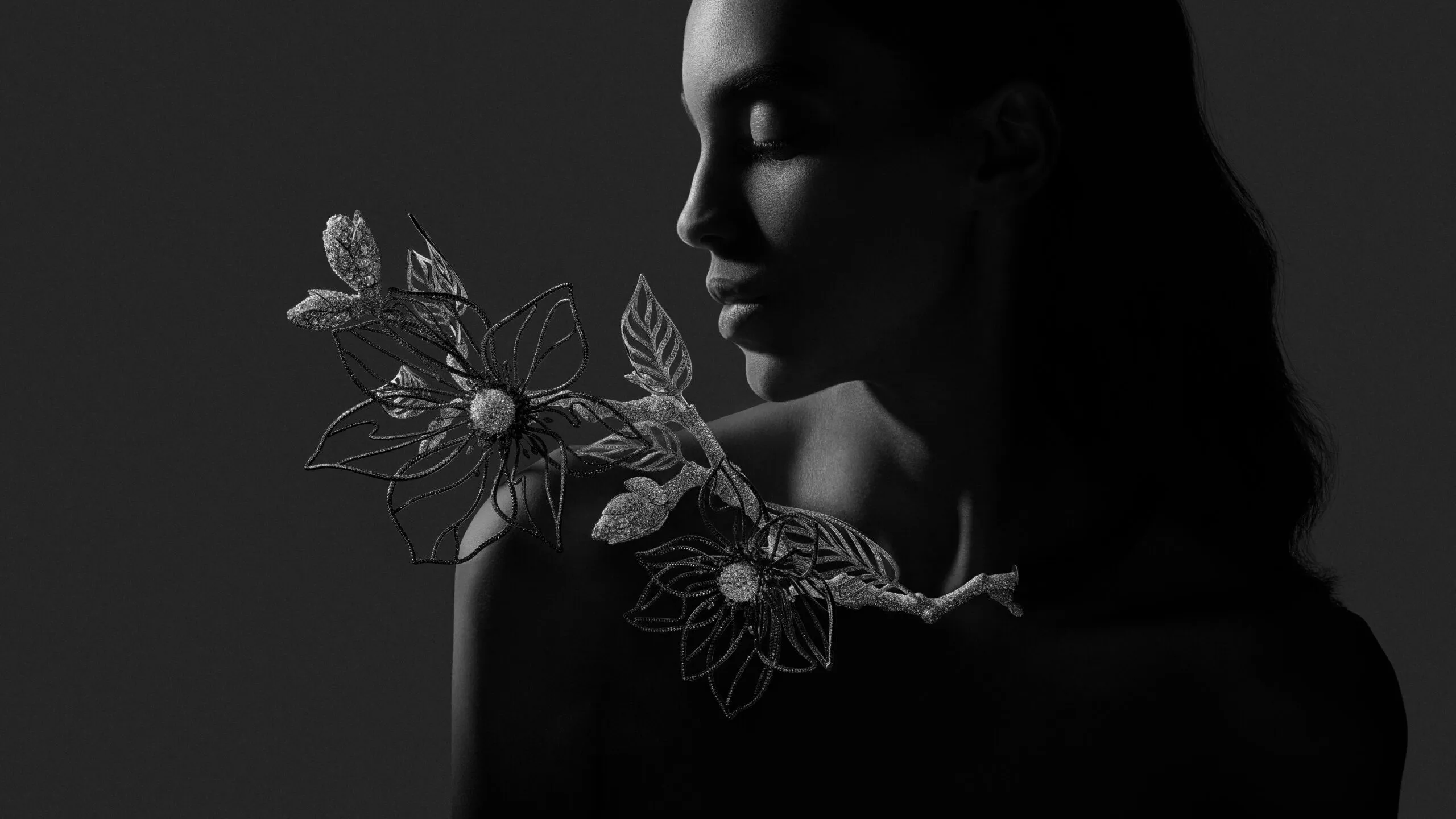 <p>Magnolia transformable head jewel-collar necklace from Composition No.2 of the Boucheron Impermanence High Jewellery collection, crafted in black anodised aluminium, snow-set diamonds, white gold, inverse-set diamonds, black rhodium, black ceramic, rose-cut diamonds and brilliant-cut diamonds </p>