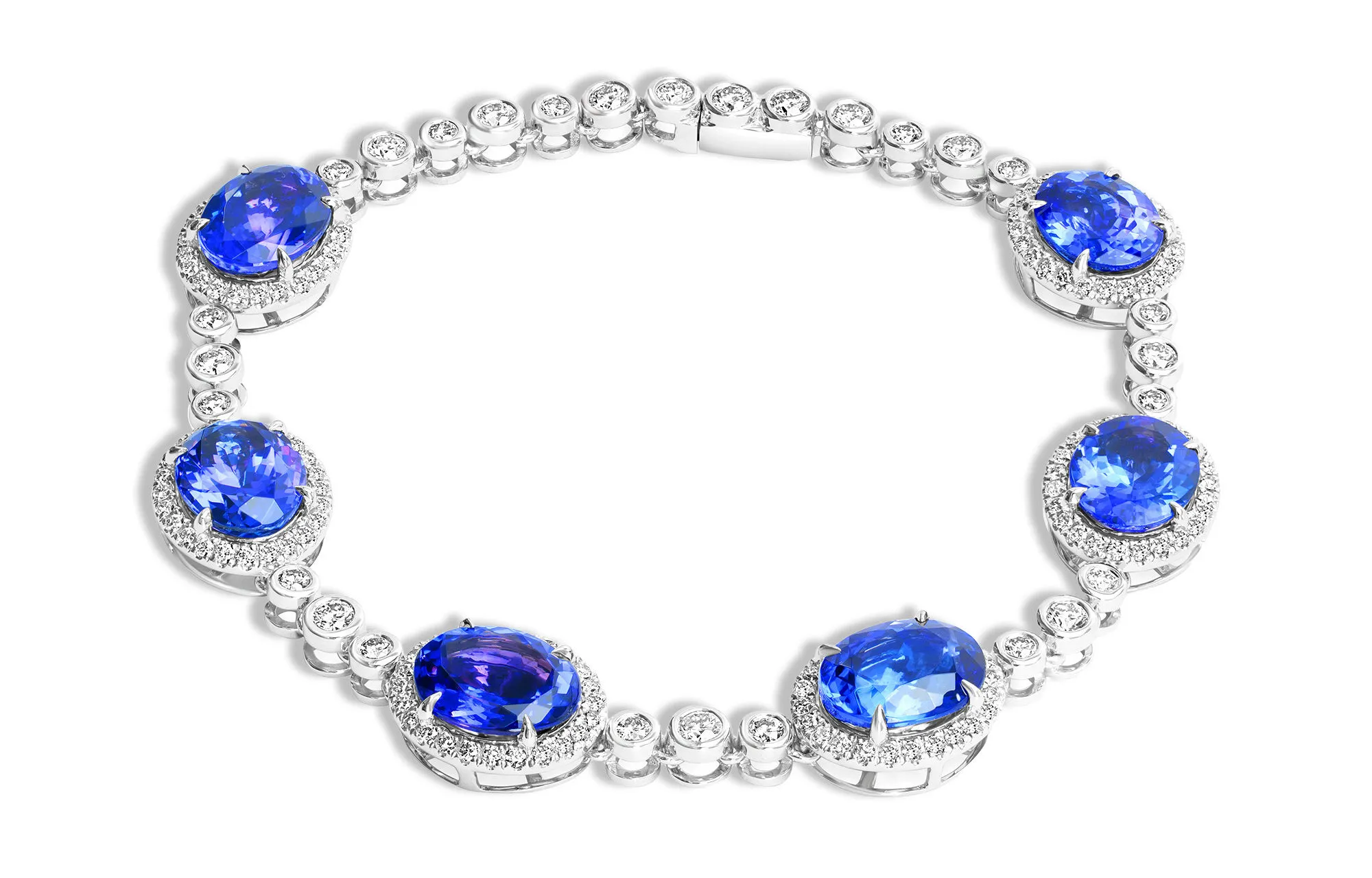 <p>Royal Touch Group bracelet with 16.85 total carats of oval-shaped tanzanites and 2.258 carats of diamonds, set in 14k white gold</p>
