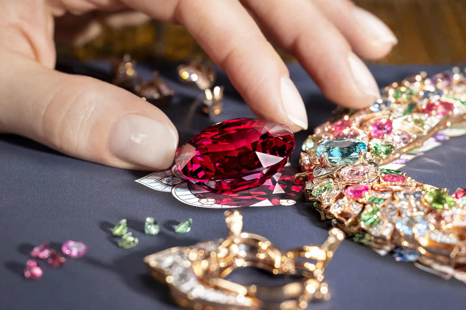 <p>Designing the Bvlgari Celestial Mosaic necklace with a 131.21-carat spinel surrounded by turquoise tourmalines, emeralds, onyx and diamonds, from the Polychroma High Jewellery collection</p>