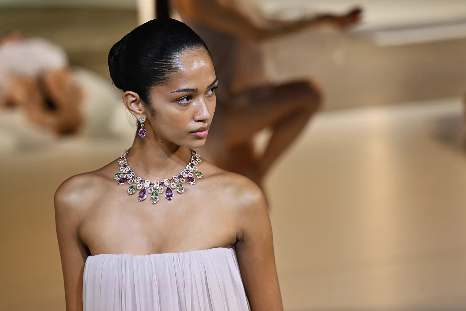 <p>A model wears a necklace from the Bvlgari Polychroma High Jewellery collection at the Greek Theatre in Taormina</p>