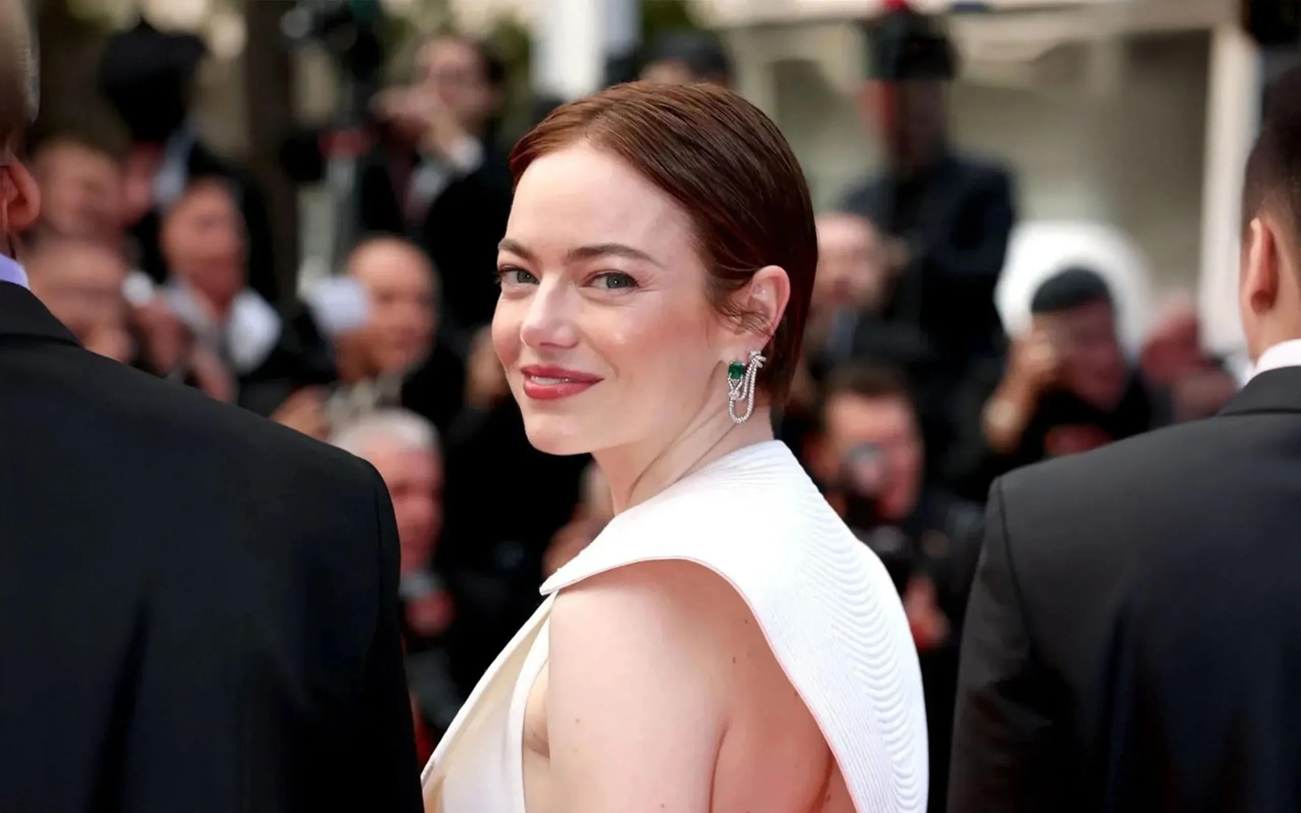 <p>Actress Emma Stone wears the Louis Vuitton Seduction earrings with octagonal-shaped emeralds to the Cannes Film Festival 2025</p>
