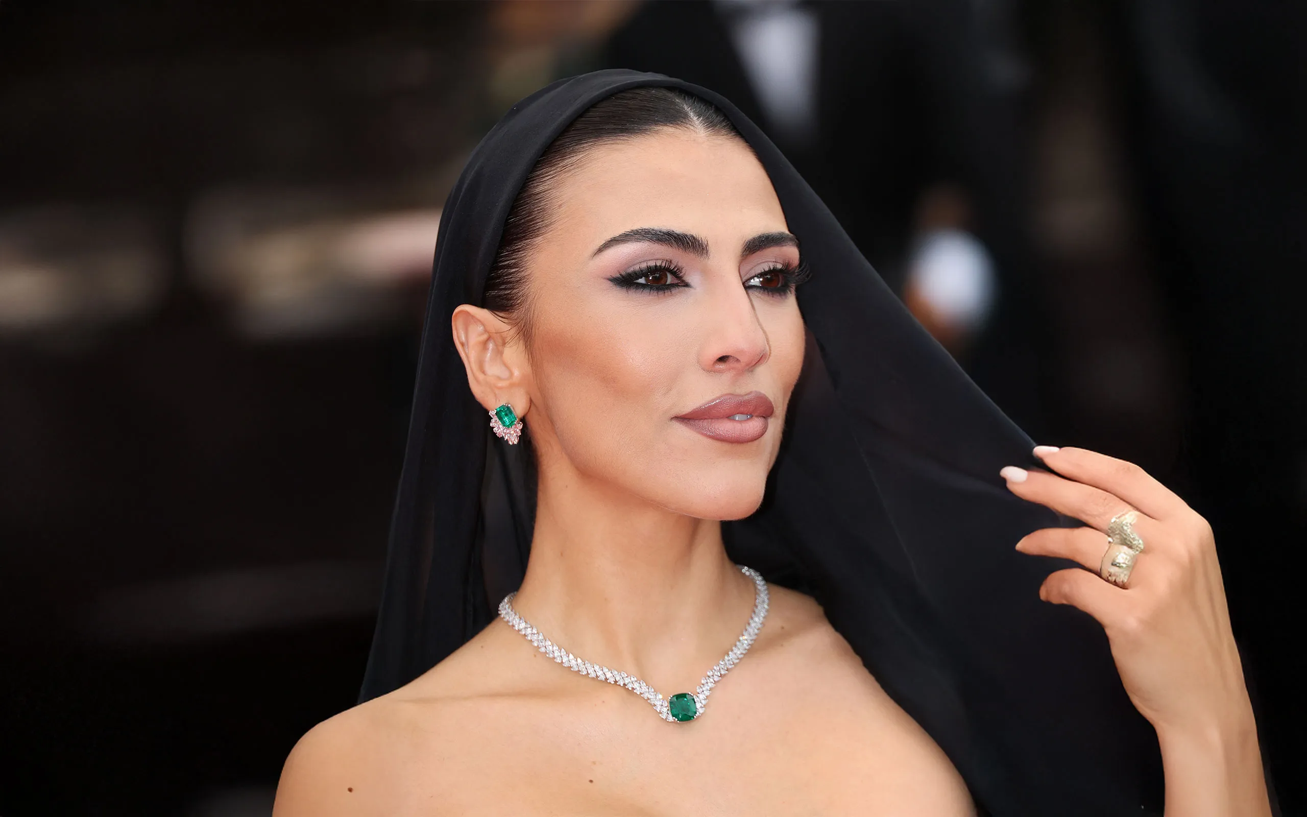 <p>Italian television presenter and model Giulia Salemi attends the Cannes Film Festival 2025 wearing an emerald and diamond necklace by Chopard</p>
