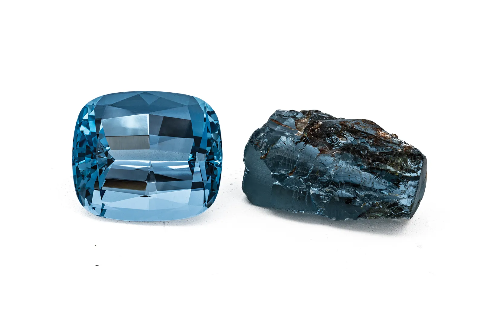 <p>A rough and cut and polished aquamarine from HC Arnoldi</p>
