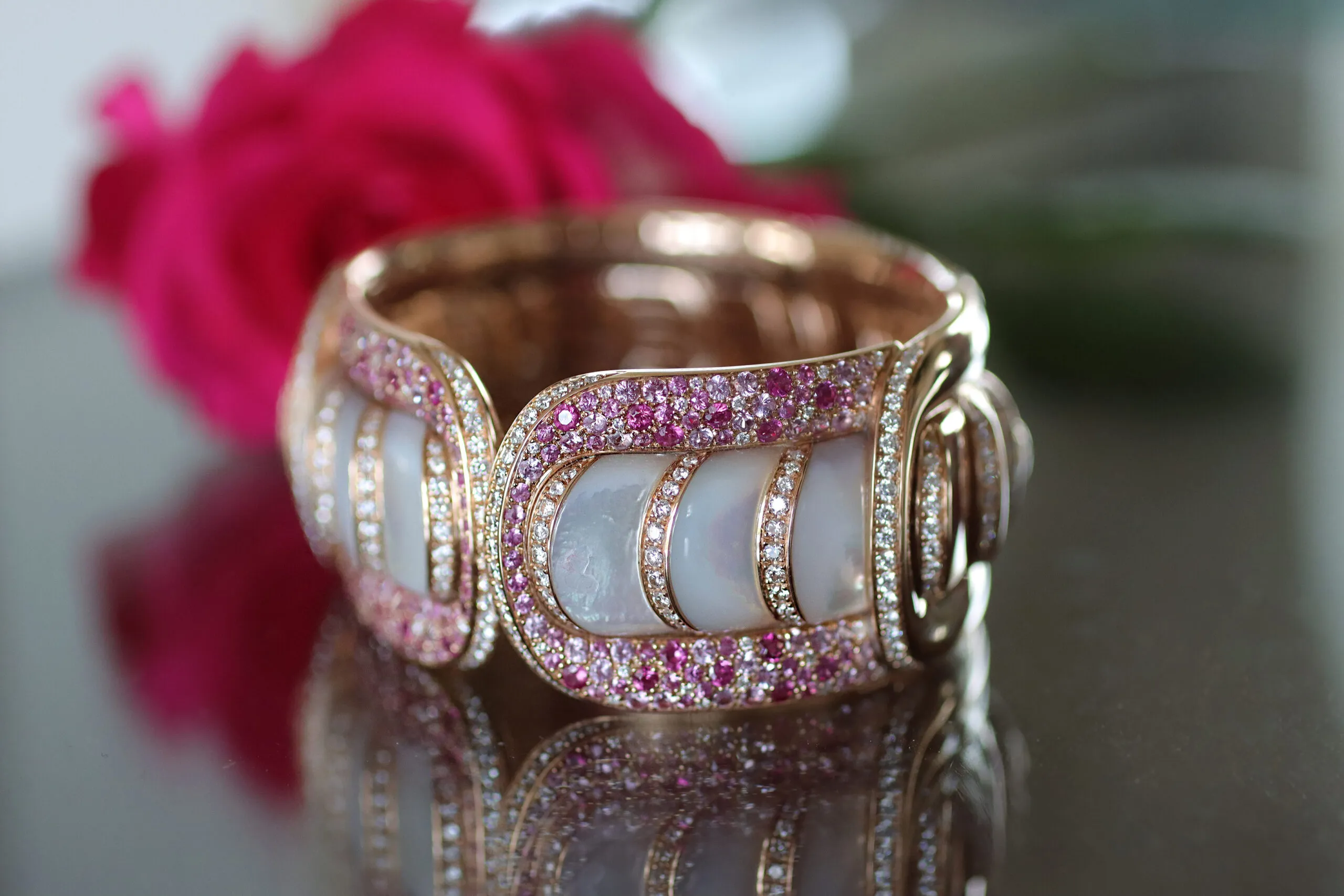 <p>Miseno Arco High Jewellery bracelet with 7.1 carats of mother of pearl, 7.88 carats of pink sapphire and 4.99 carats of white diamonds, set in 18k pink gold</p>
