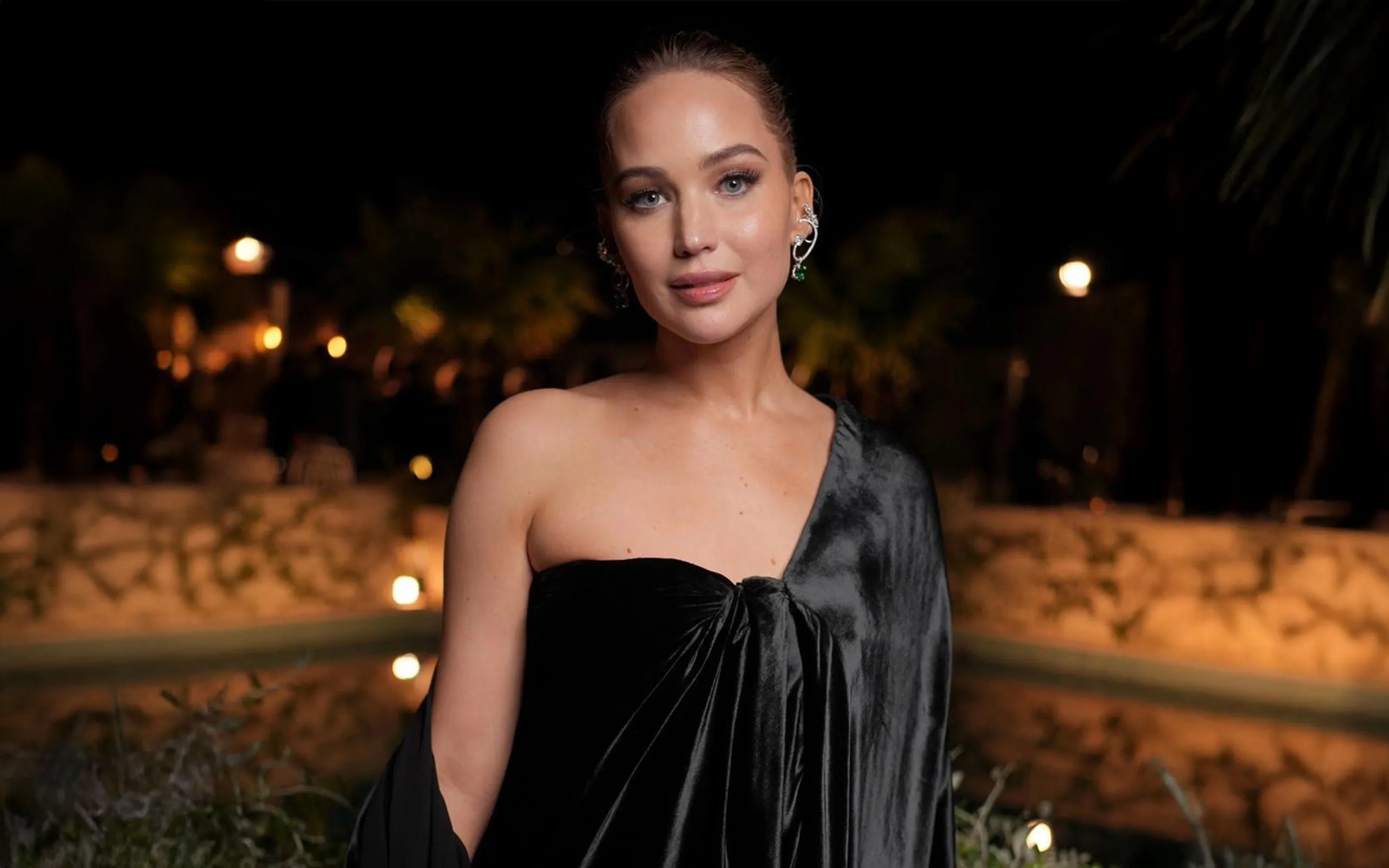 <p>Actress Jennifer Lawrence wears the Diamond Georgia ear piece, the Diamond Lina ear piece and the Constance earrings with diamonds and emeralds, all by Ana Khouri, to the Cannes Film Festival 2025</p>
