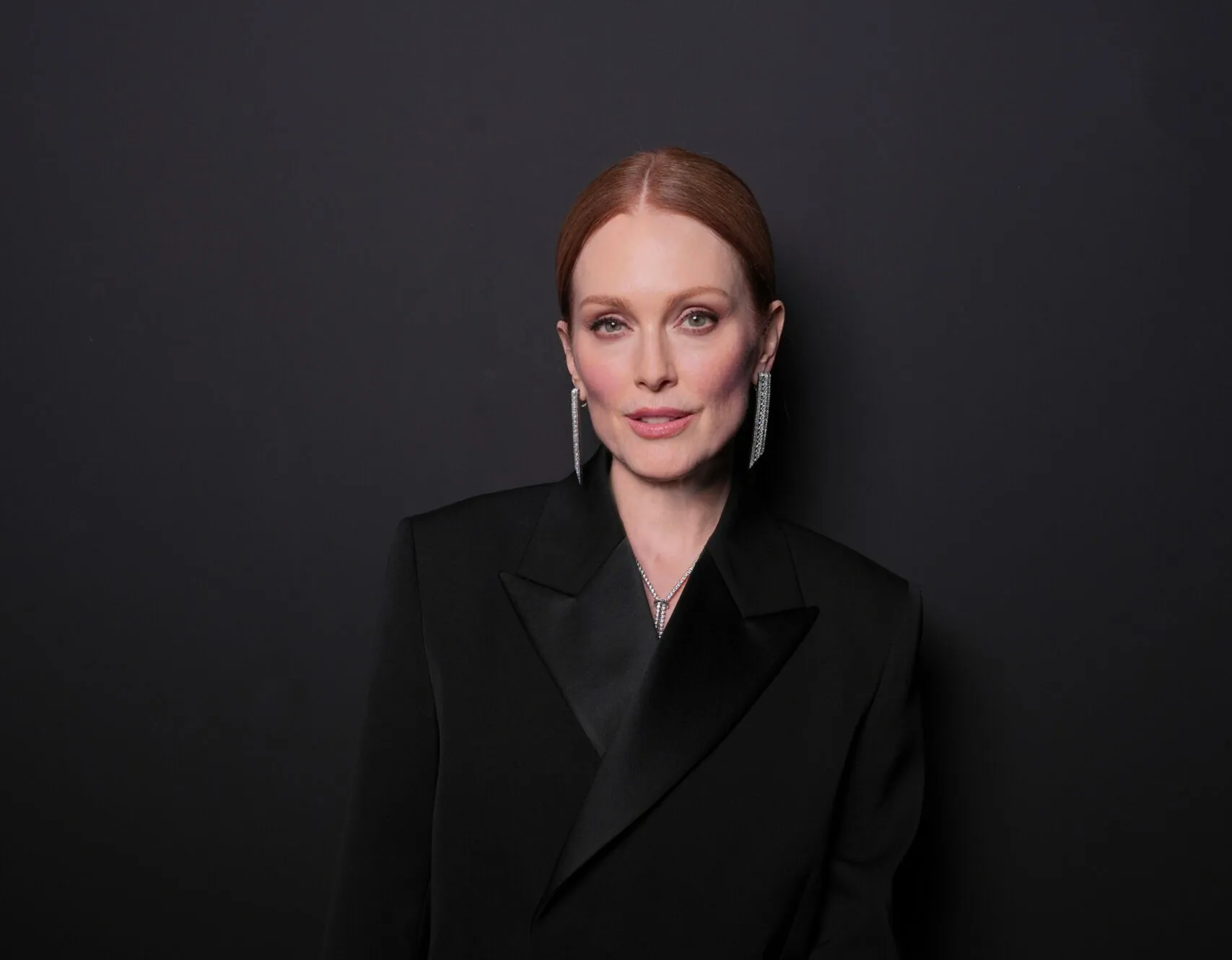 <p>American actress Julianne Moore wears the Boucheron Quatre Radiant pendant earrings, the Pompom necklace, and the Vendôme Liseré ring at the Cannes Film Festival 2025</p>
