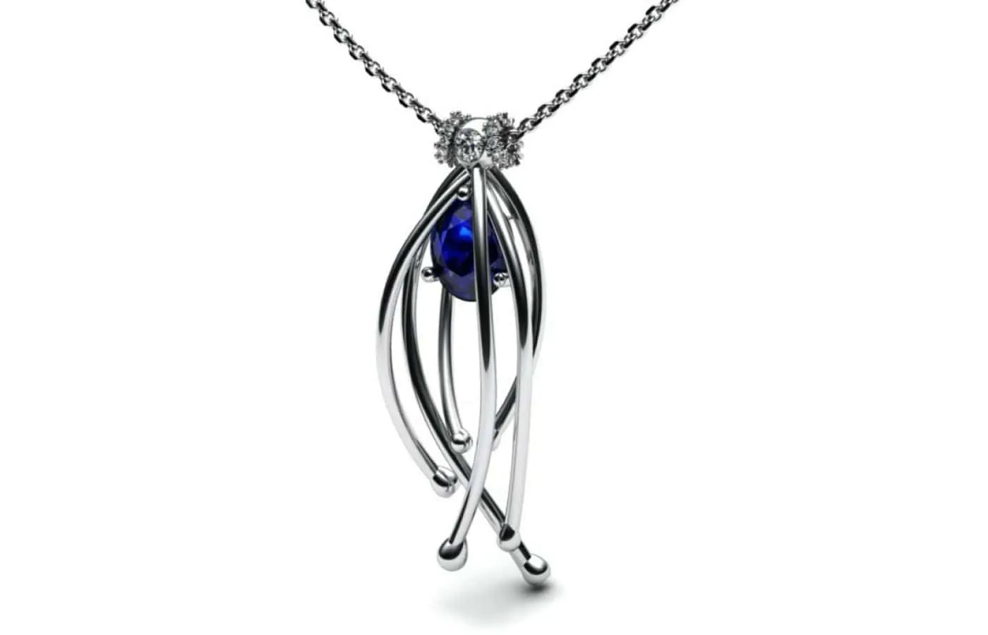 <p>Korbička Šperky pendant in 18k white gold with a natural deep blue oval-shaped sapphire</p>
