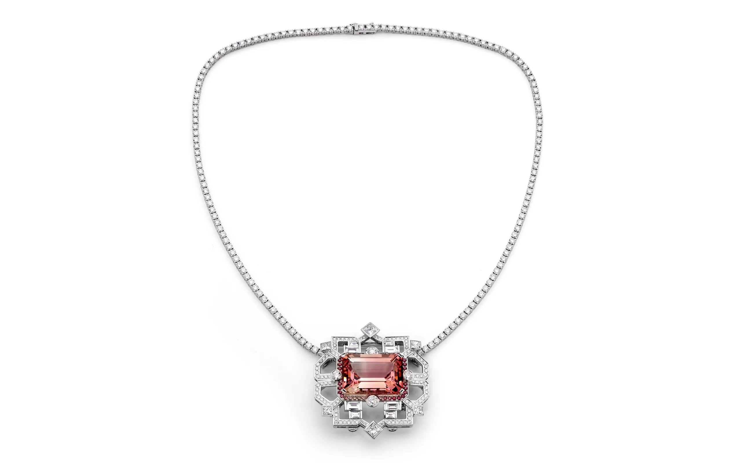 <p>The final product – a transformable brooch-pendant by Matthew Ely with a 24.34 carat bi-colour tourmaline surrounded by colour fade sapphires and diamonds, set on a diamond line necklace in 18k white gold </p>