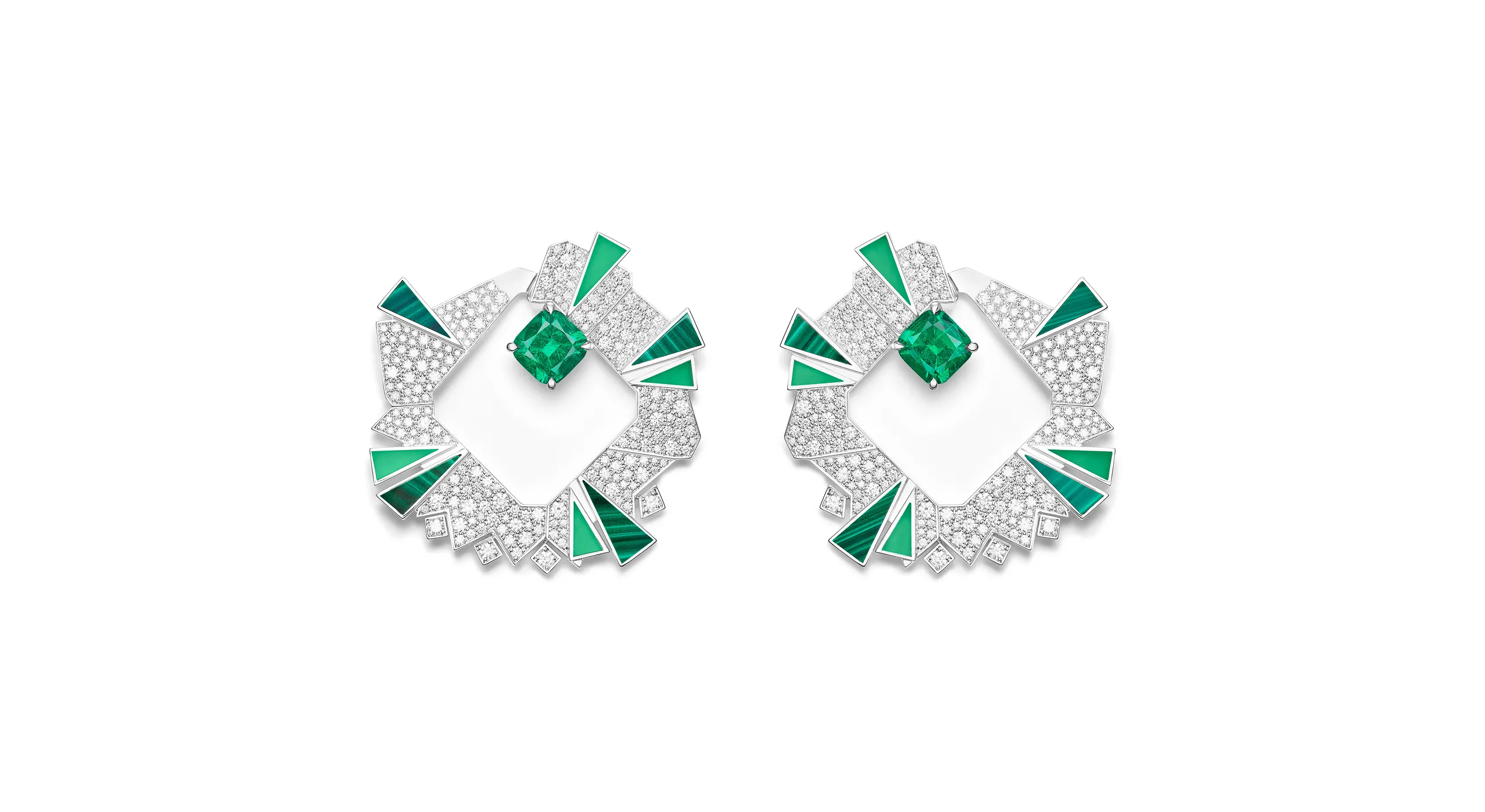 <p>Like the graphic &#8220;pow!&#8221; in a Roy Lichtenstein painting, the hoop earrings in the Arty Pop suite go full 1970s, their jagged outlines set with cushion cut Colombian emeralds, diamonds and triangles of malachite and chrysoprase</p>
