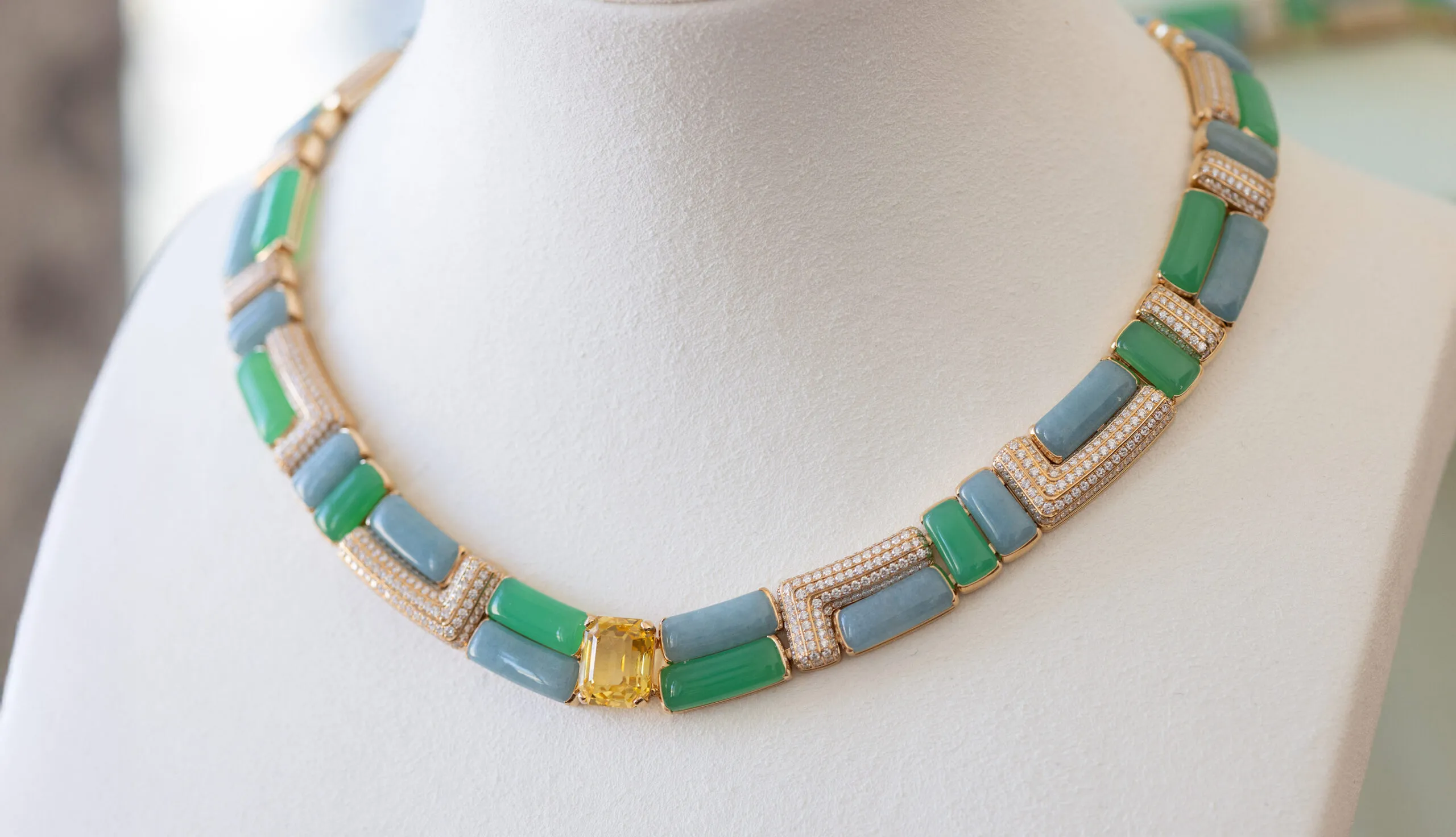 <p>In the Curved Artistry high jewellery suite, Piaget sets cool green chrysoprase beside milky blue troilite, punctuated by the brilliance of a 10.91 carat octagonal cut yellow sapphire from Sri Lanka</p>
