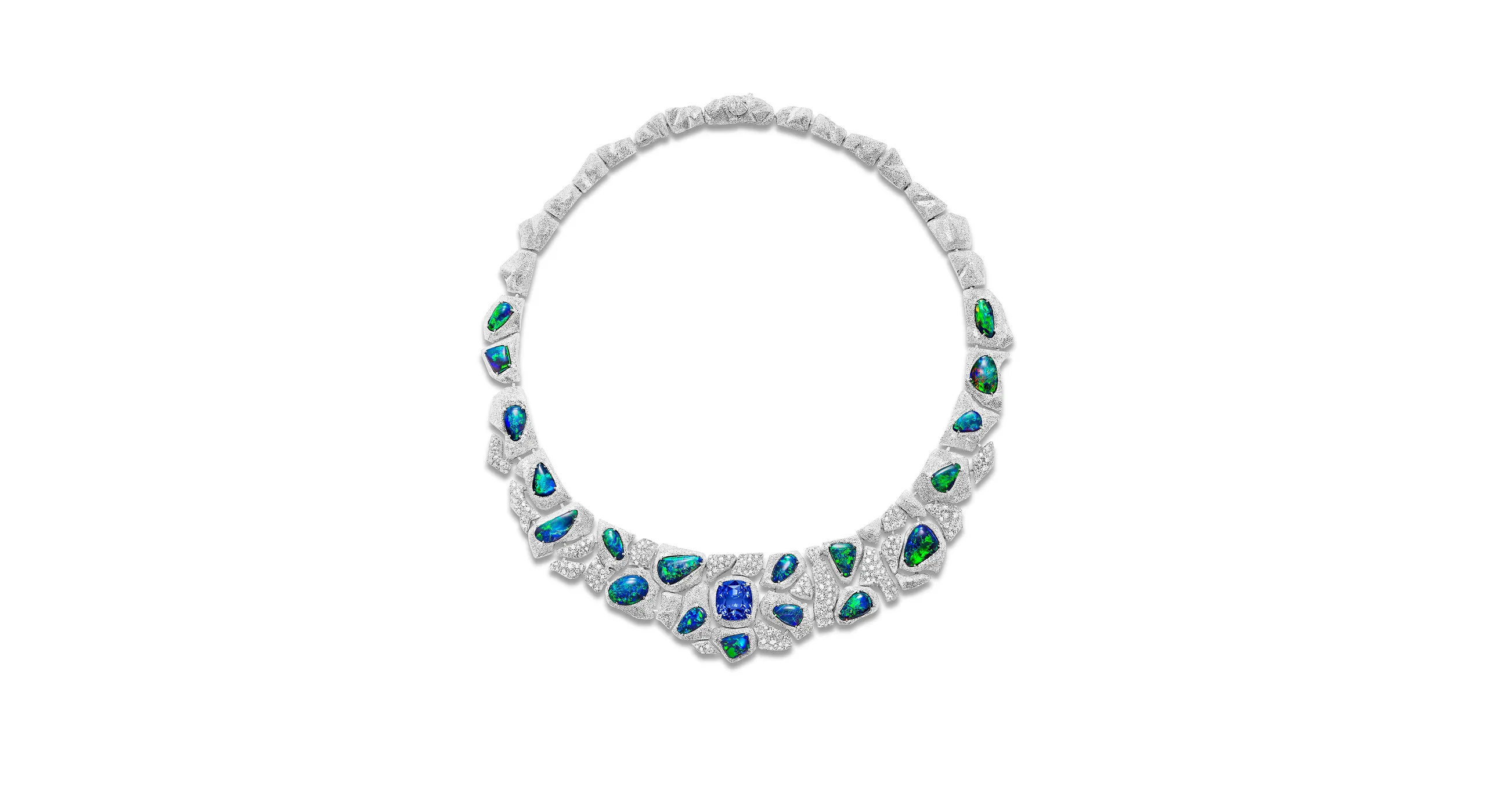 <p>The design of the Flowing Curves suite, set with rare black Australian opals framed by cascades of diamonds, echoes the motion of water</p>
