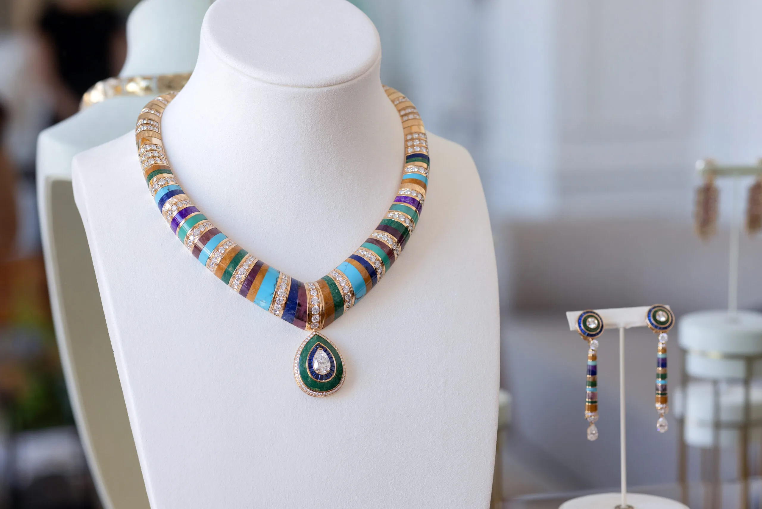 <p>The Op Art-inspired collar from the Kaleidoscope Lights suite, striped with slices of jasper, turquoise, chrysoprase and rhodochrosite, alongside lesser-known sodalite, sugilite, ruby roots and rhodonite</p>
