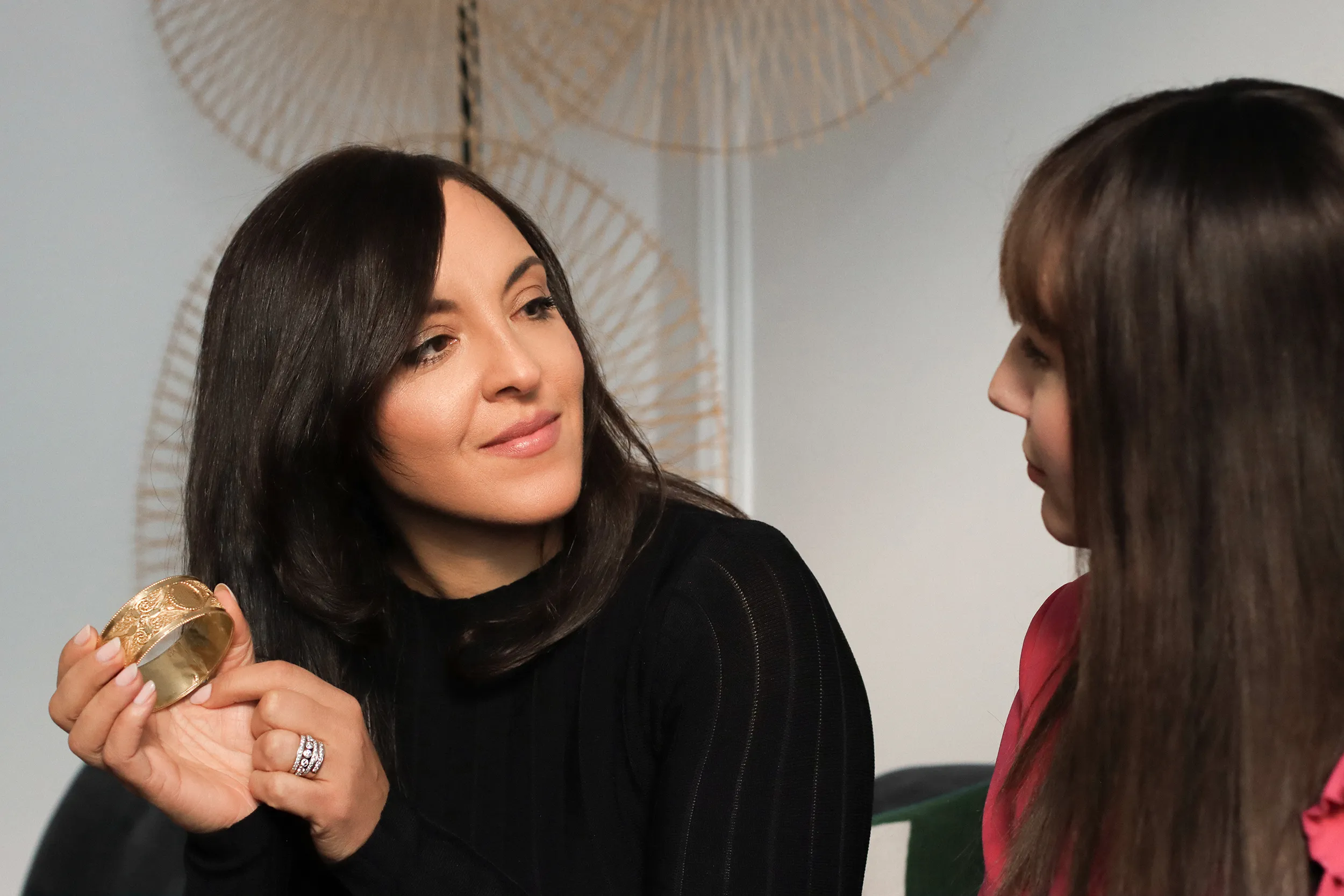 <p>Princess Yasmine and Katerina Perez discuss the importance of generations of women sharing jewellery, such as the yellow gold bangles that were passed to Her Royal Highness from her mother and grandmother</p>