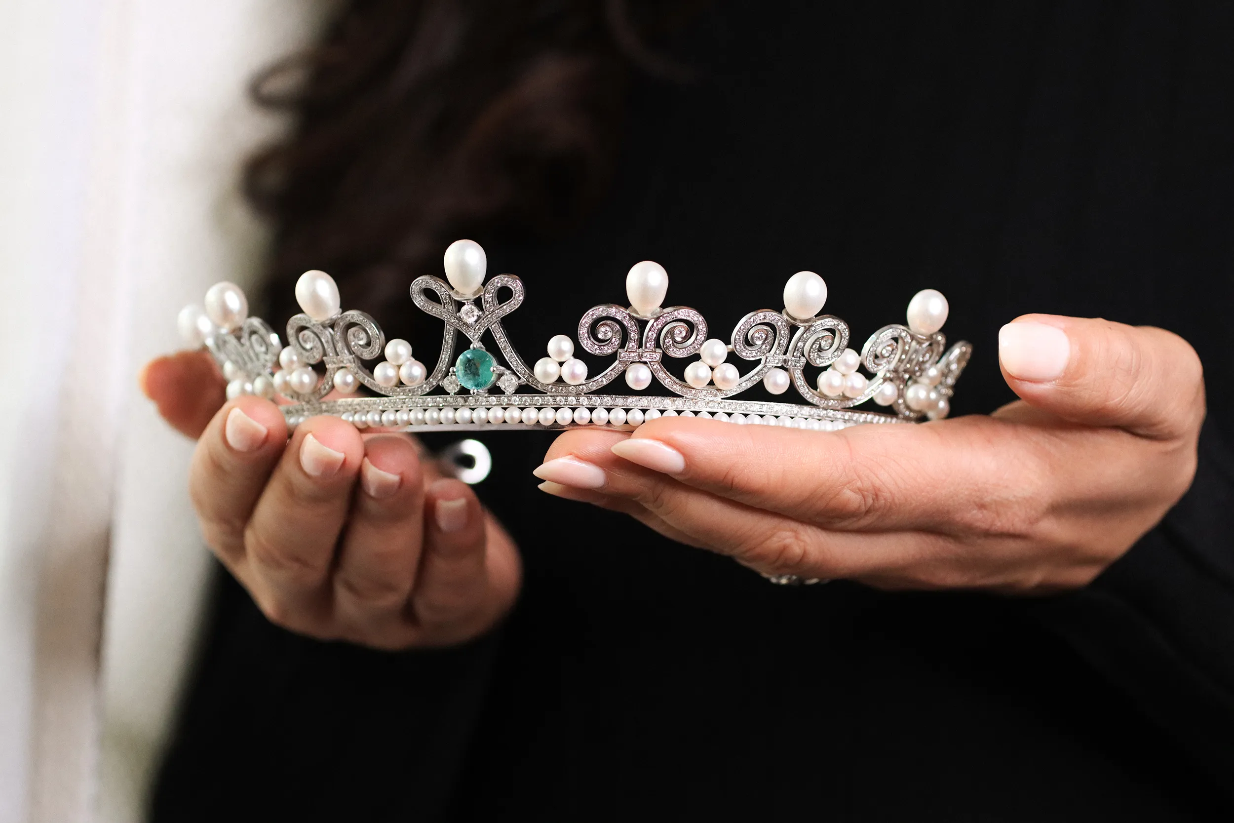 <p>Her Royal Highness Princess Yasmine Murat, Princess of Pontecorvo, continued the historic tradition of French aristocrats wearing tiaras by commissioning this special piece for her wedding day, set with pearls, diamonds and a central emerald in white gold </p>