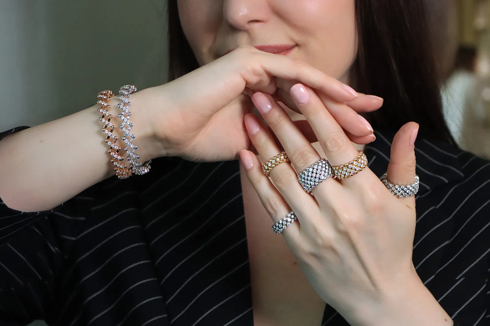 <p>Katerina Perez wears multi-sized rings and expanding ring-to-bracelet jewels by Serafino Consoli</p>