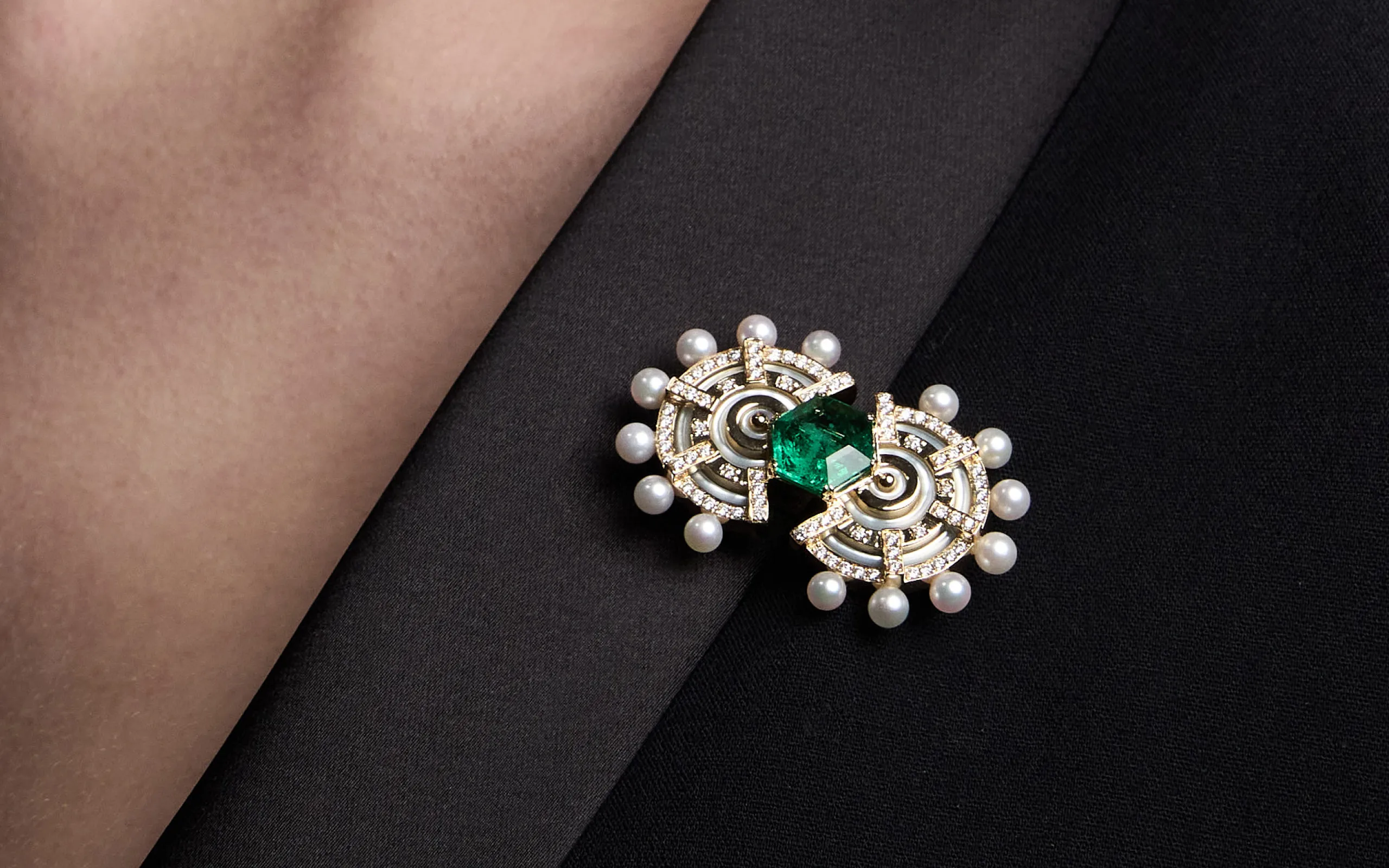 <p>The State Property Raisina Snowdrop brooch, part of the Special Edition Gardens collection, is inspired by the blueprints of the Amrit Udyan gardens in India, featuring emeralds, diamonds, Akoya pearls, and mother of pearl in 18k gold</p>
