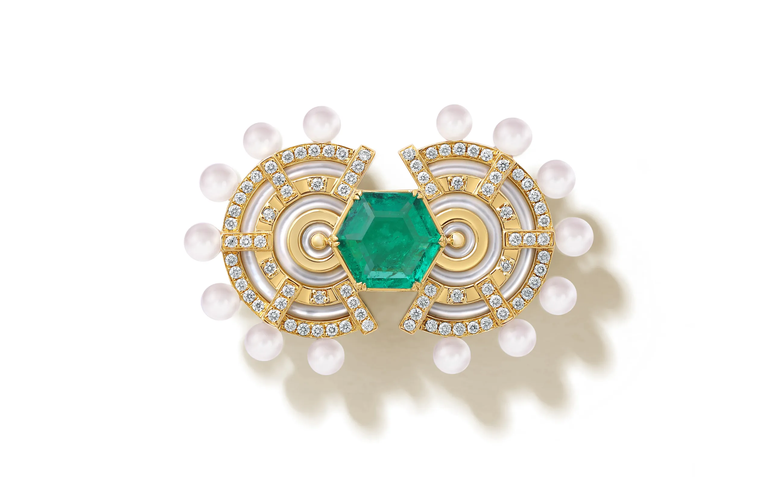 <p>The State Property Raisina Snowdrop brooch draws inspiration from the Art Deco period as well as the Amrit Udyan gardens in India, featuring emeralds, diamonds, Akoya pearls, and mother of pearl in 18k gold</p>