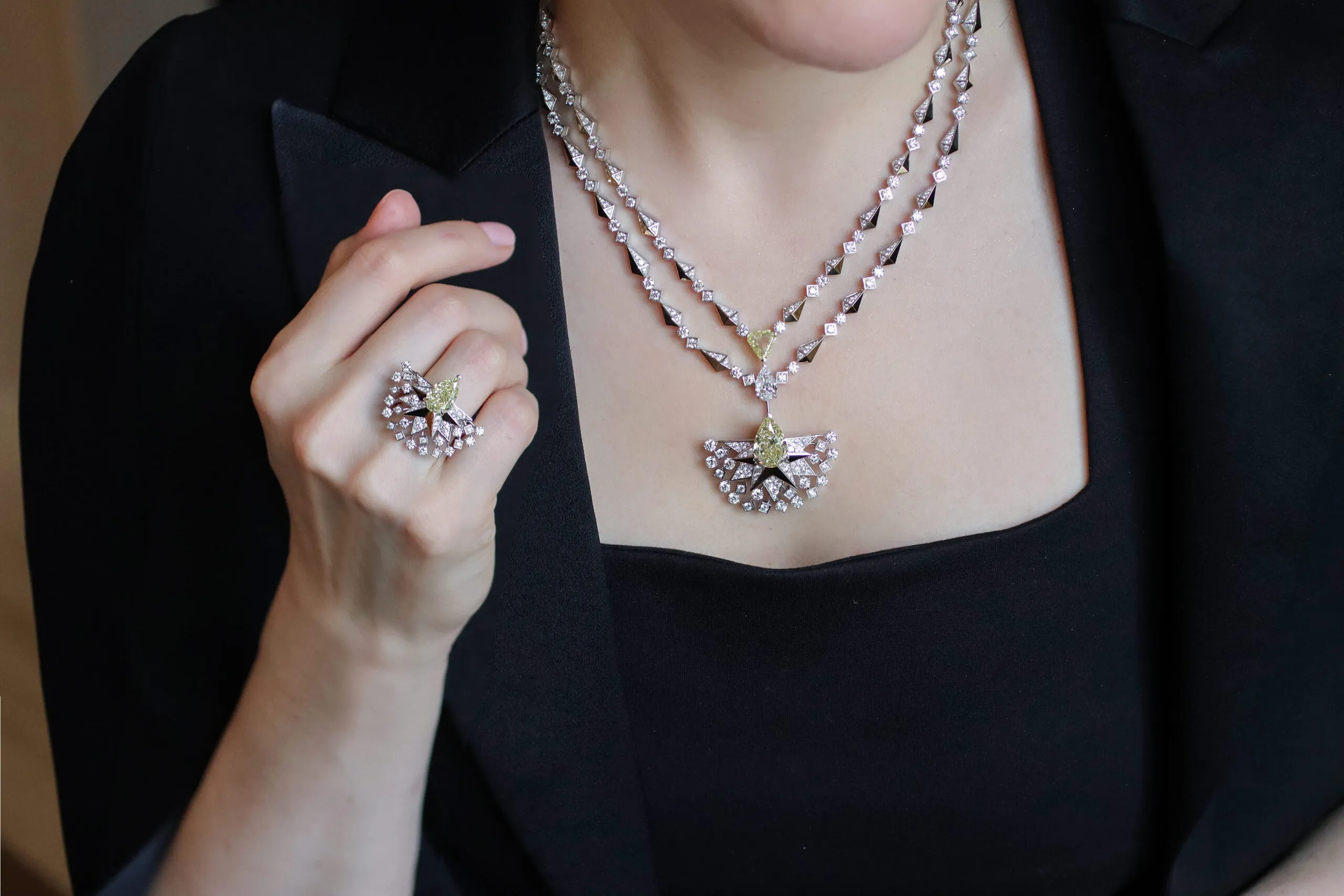 <p>Katerina Perez wears the Sahag Arslanian Sun Rays High Jewellery necklace with an 8.88-carat pear-shaped fancy yellow VS2 diamond, a 2.03-carat triangular-shaped fancy intense yellow SI1 diamond, and a 2.01-carat pear-shaped E-colour, VS1 diamond, surrounded by 17.04 carats of round white diamonds, set in 18k white and yellow gold, alongside the Sun Rays High Jewellery ring with a 3.38-carat pear-shaped fancy yellow VS2 diamond and round white diamonds, also in 18k gold </p>

