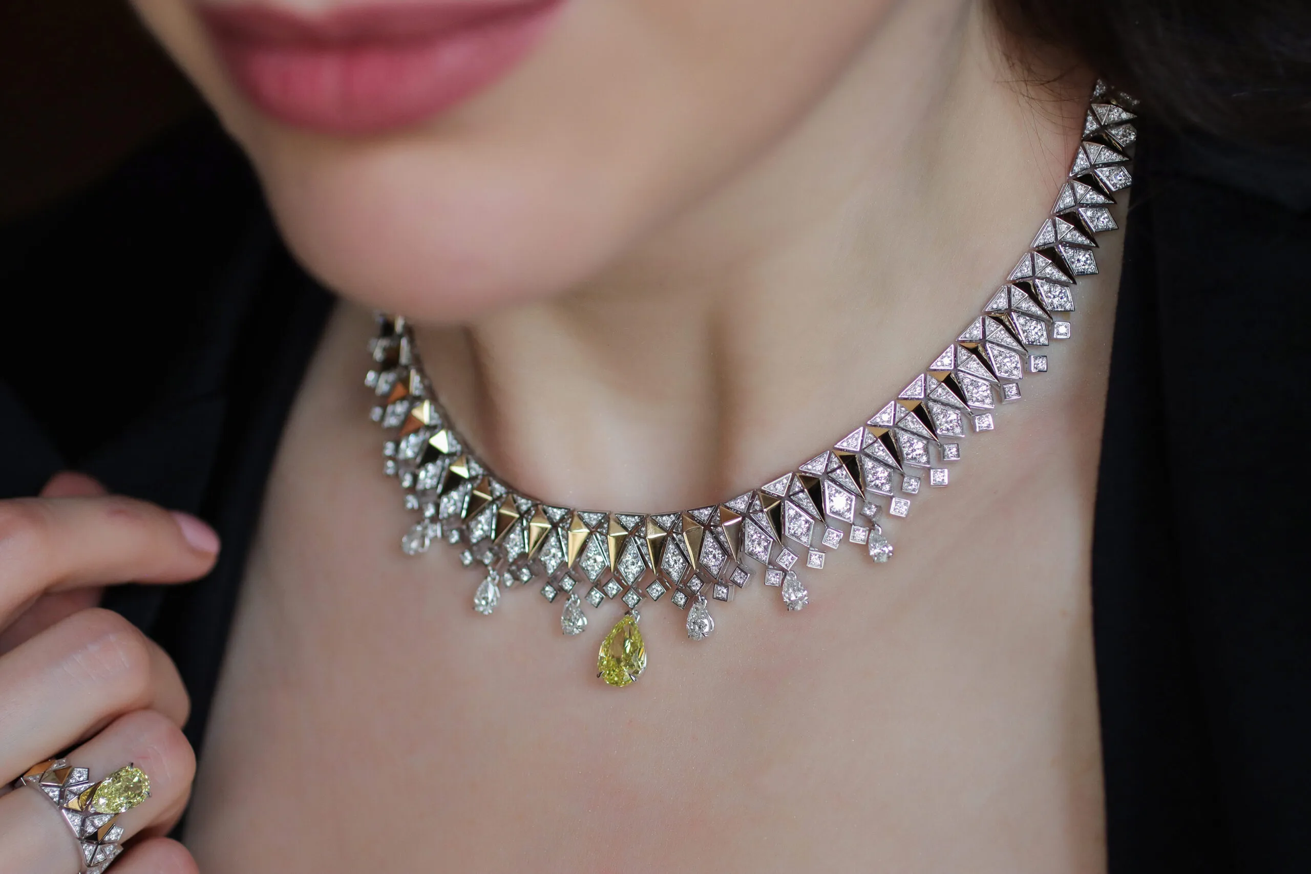 <p>Katerina Perez wears the Sahag Arslanian Sun Rays High Jewellery collier with a 3.14-carat pear-shaped fancy intense yellow SI1 diamond, surrounded by pear-shaped white diamonds and 10.44 carats of round white diamonds set in 18k gold </p>
