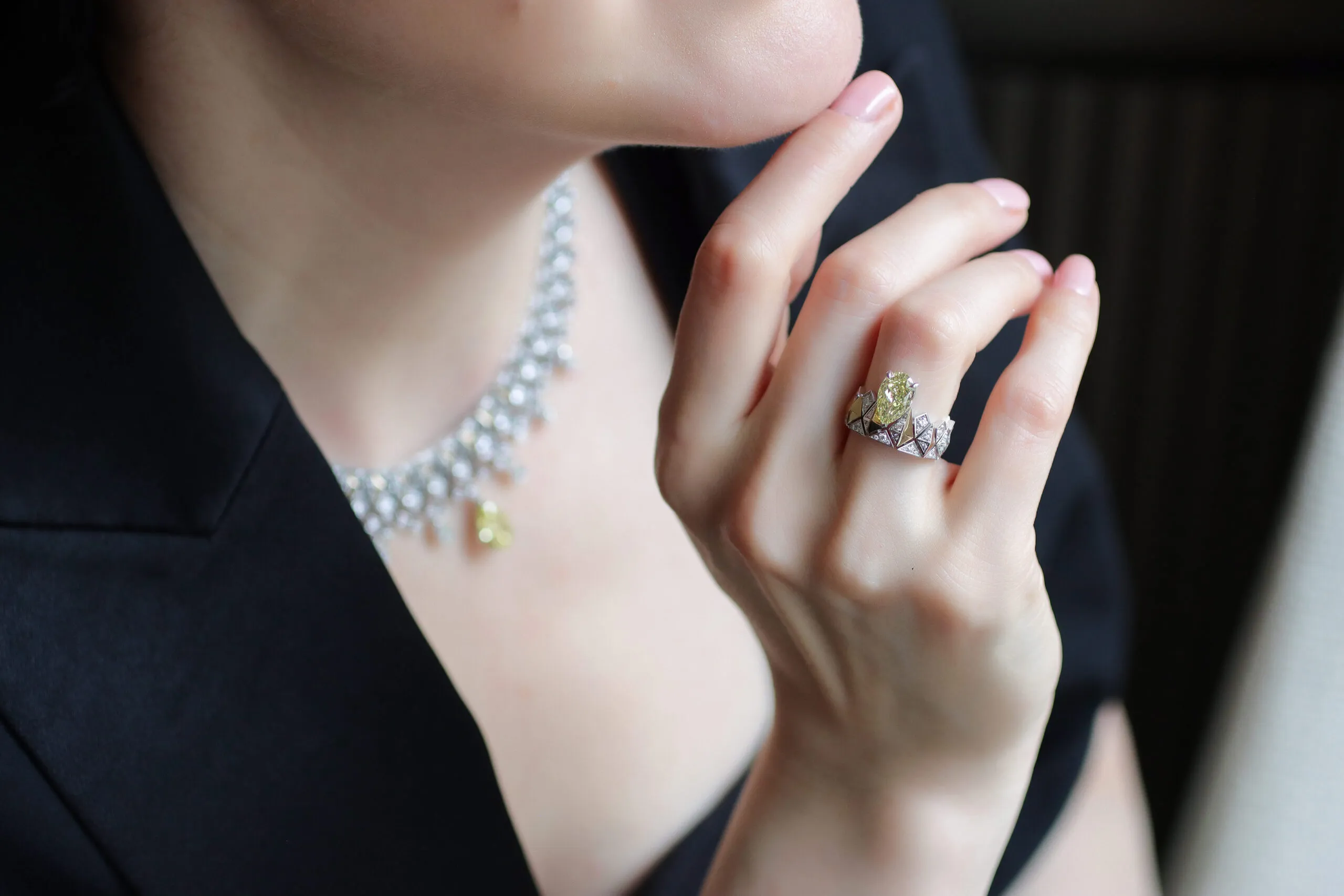 <p>Katerina Perez wears the Sahag Arslanian Sun Rays ring with a 2.38-carat pear-shaped fancy intense yellow VS2 diamond, surrounded by 0.64 carats of white diamonds and set in 18k gold, alongside the matching necklace </p>
