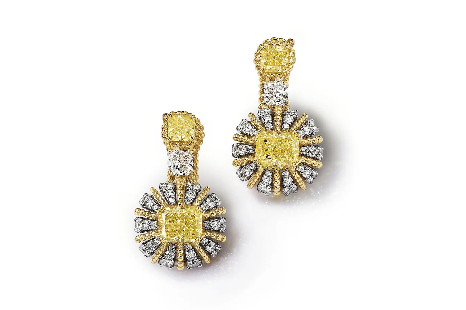 <p>Tiffany &#038; Co. Urchin earrings with fancy intense yellow diamonds weighing over 4 carats total set in 18k yellow gold and platinum, surrounded by yellow and white diamonds, from the Sea of Wonder Blue Book 2025 High Jewellery collection </p>
