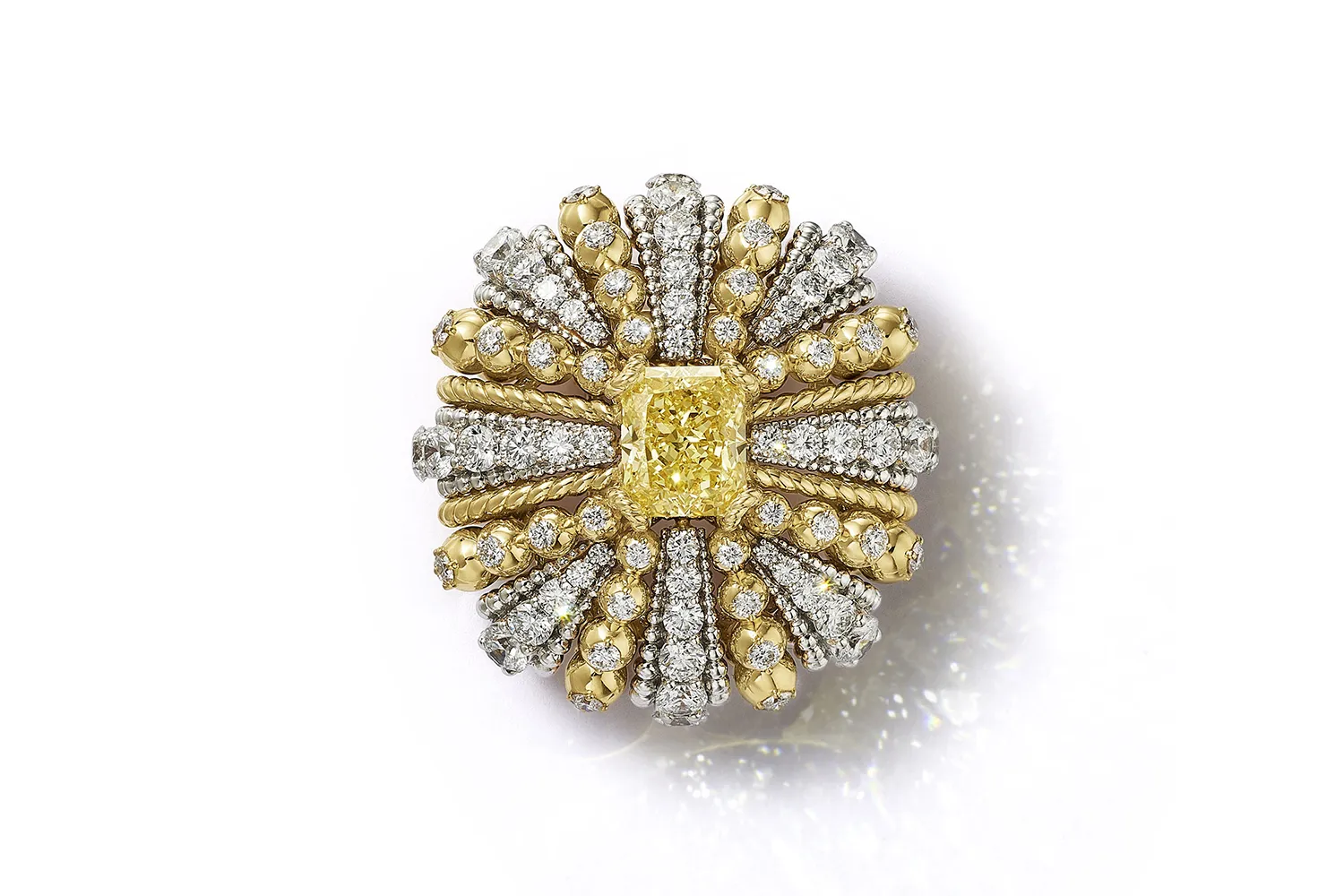 <p>Tiffany &#038; Co. Urchin ring with a fancy intense yellow diamond of over 9 carats set in 18k yellow gold and platinum, surrounded by white diamonds, from the Sea of Wonder Blue Book 2025 High Jewellery collection </p>
