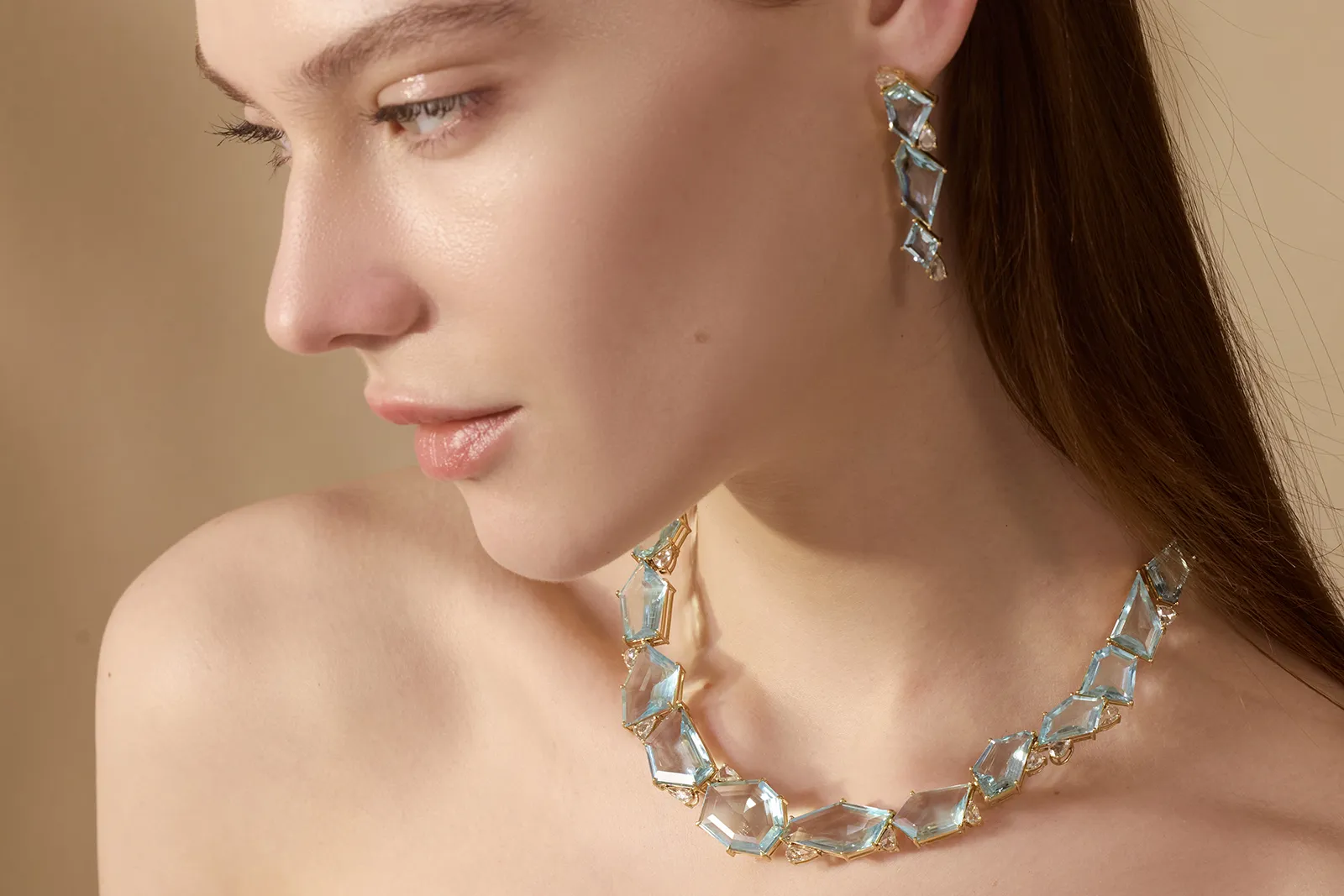 <p>A model wears the Aquamarine Contour necklace from Yi Collection, which was created to celebrate the brand’s 10th anniversary</p>