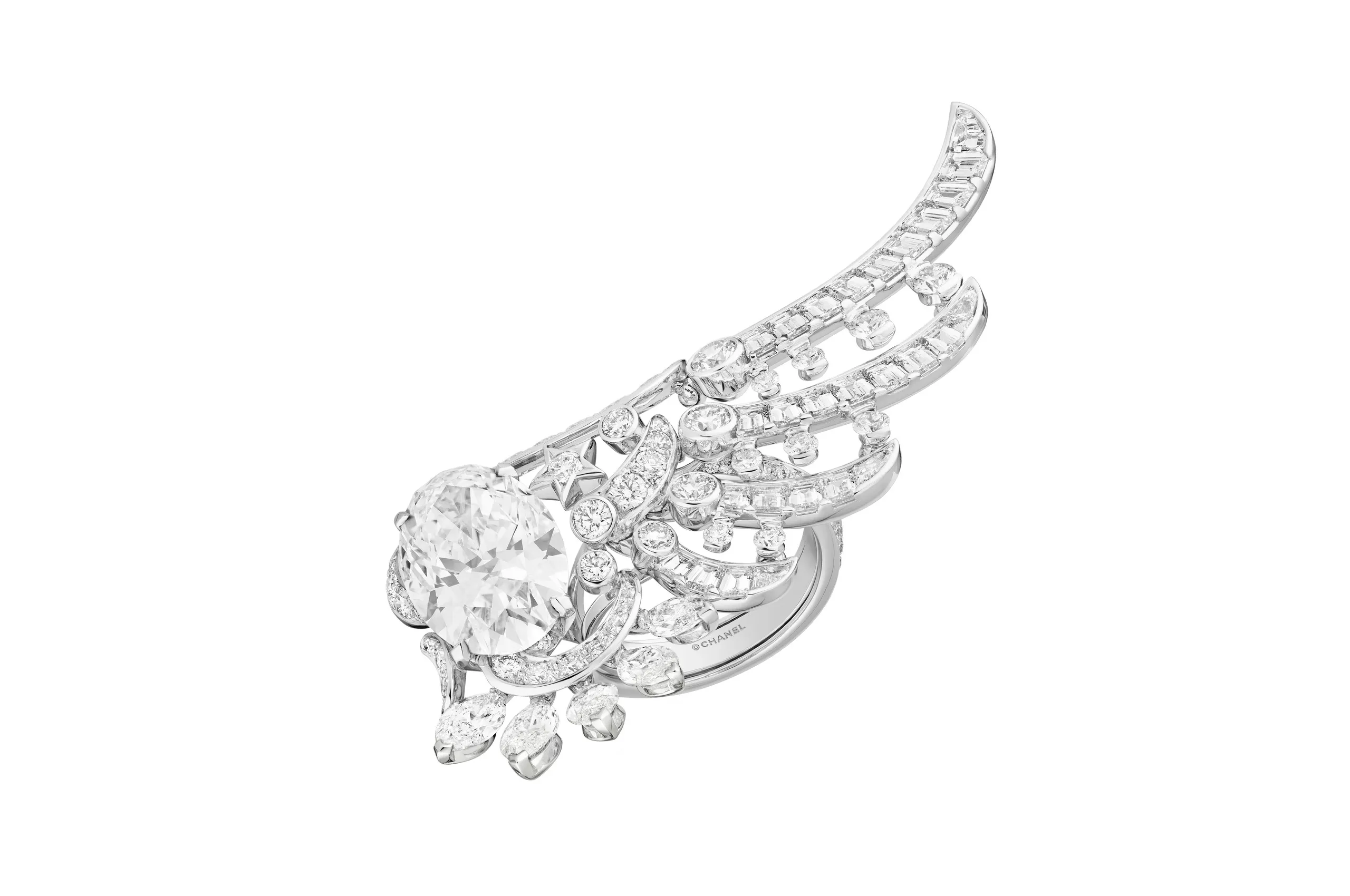 <p>Chanel Wings of Chanel ring with an oval-cut diamond of 8.15 carats set alongside further diamonds in white gold from the Reach for the Stars High Jewellery collection</p>