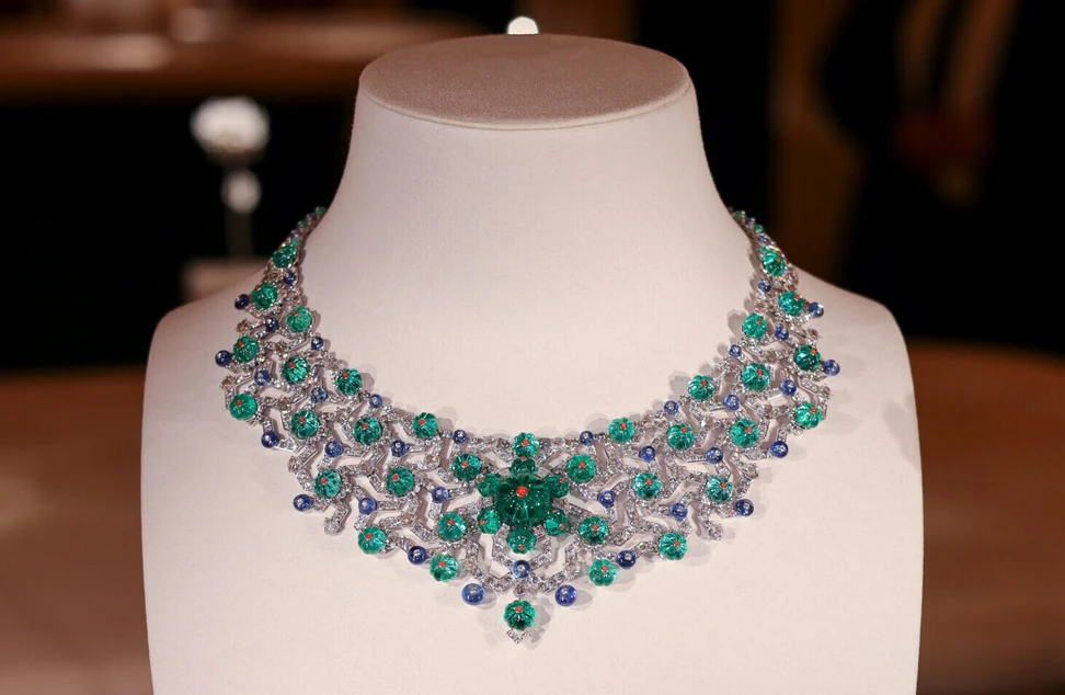 <p>Cartier Echina necklace inspired by the shape of sea urchins with red coral, pierced sapphire beads, and diamonds in a geometric lacework of white gold, from the Nature Sauvage High Jewellery Collection Chapter III</p>
