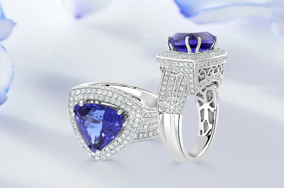 <p>Royal Touch Group ring with a 5.19 carat AAAA trillion-cut tanzanite and 1.57 carats of diamonds set in 14k white gold</p>
