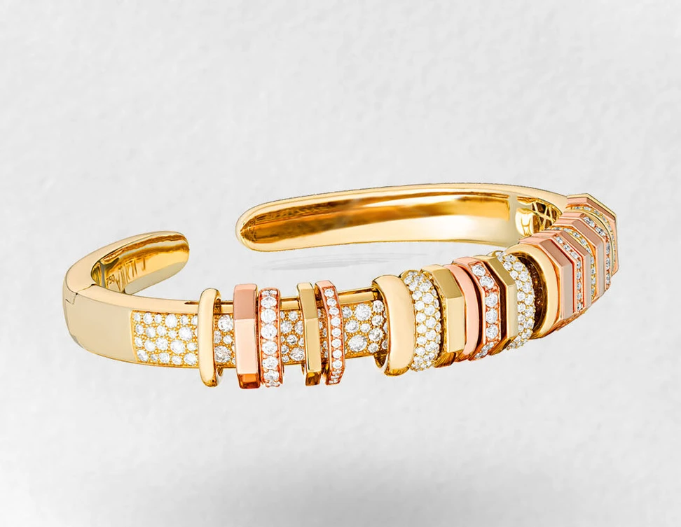 <p>Marceline Paris Akasha bangle with 3.25 carats of diamond pavé in 18k yellow and rose gold </p>