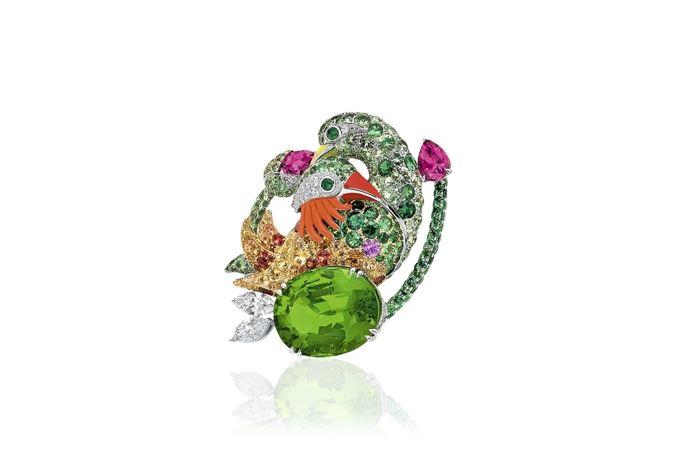 <p>Anna Hu ‘Mandarin Oriental Ducks’ brooch with 26.13 ct peridot, carved pink coral, rubies, peridots, yellow, orange and violet sapphires</p>
