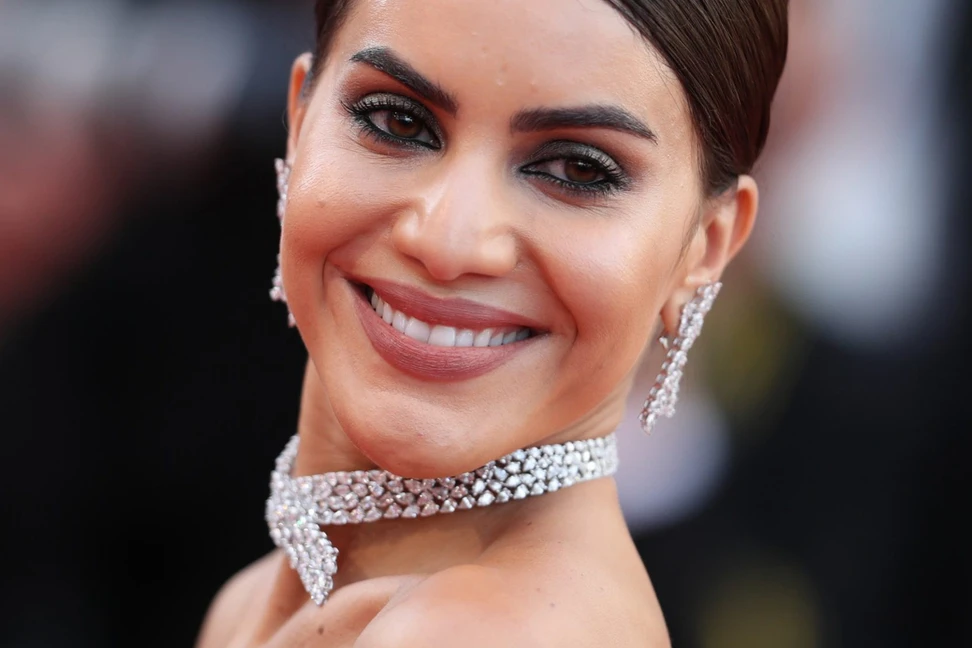 <p>Camila Cabello in Messika ‘Love Knot’ diamond necklace and earrings</p>