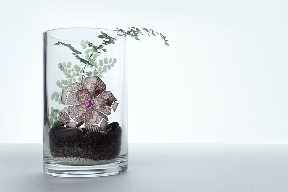 <p>Chanel Sunset Camelia Brooch in white and rose gold with 3.07 ct Padparadscha sapphire, opals and diamonds</p>
