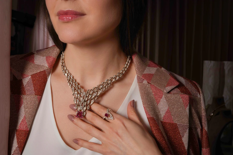 <p>Katerina Perez wears the ‘A Radiant Revelation’ necklace from Zoya’s Her Becoming collection, featuring over 500 natural trapezoid, baguette and marquise-cut diamonds and an alluring ruby centrepiece</p>