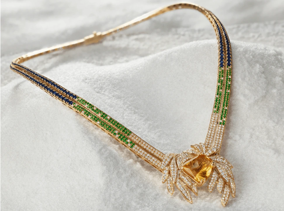 <p>Zoya ‘Dancing in the Wind’ necklace from the Alive collection with a 14-carat citrine, framed by shimmering diamonds that flow into a vibrant array of blue sapphires and tsavorites, conjuring a field of wildflower blossoms dancing on a warm summer breeze</p>