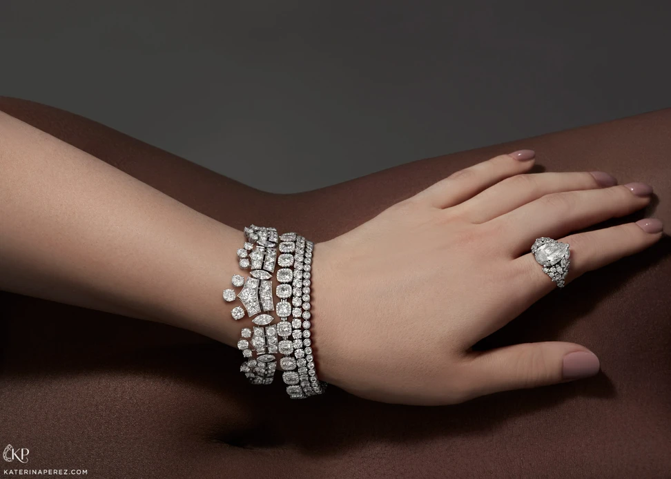 <p>From left to right: De Beers &#8216;Phenomena&#8217;, &#8216;Aura&#8217; and &#8216;Classic Lines&#8217; bracelets with diamonds and &#8216;London&#8217; ring from the &#8216;Thames Path&#8217; collection with pear cut feature diamond and accenting diamonds</p>
<p>&nbsp;</p>

