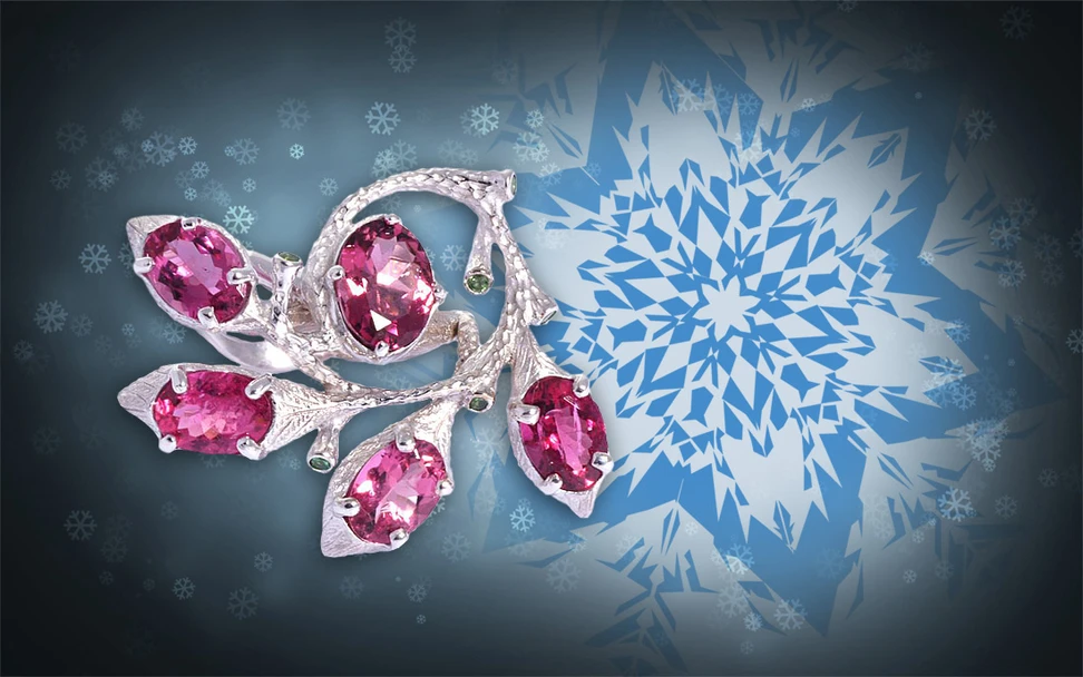 <p>Dhara White gold ring with pink tourmalines and tsavorites</p>
