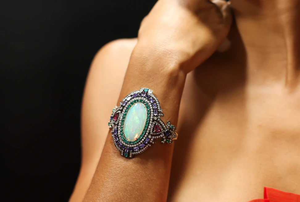 <p>Dorion Soares Amazonia bracelet with a 46 carat Ethiopian opal, tanzanites, rubellites, emeralds, Paraiba tourmaline and diamonds, crafted in 18k gold </p>