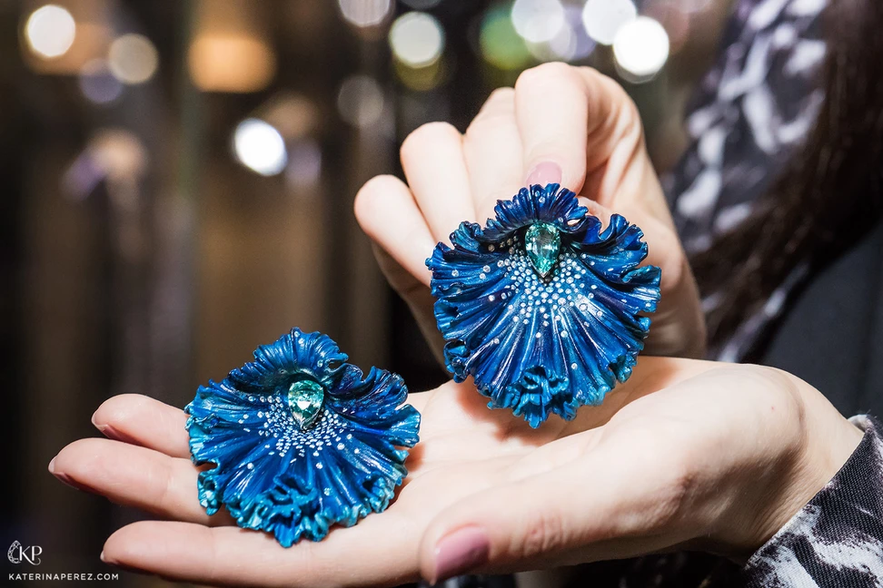 <p>Emmanuel Tarpin ‘Blue Orchid’ earrings in aluminium, Paraiba and diamonds. Photo by Simon Martner</p>