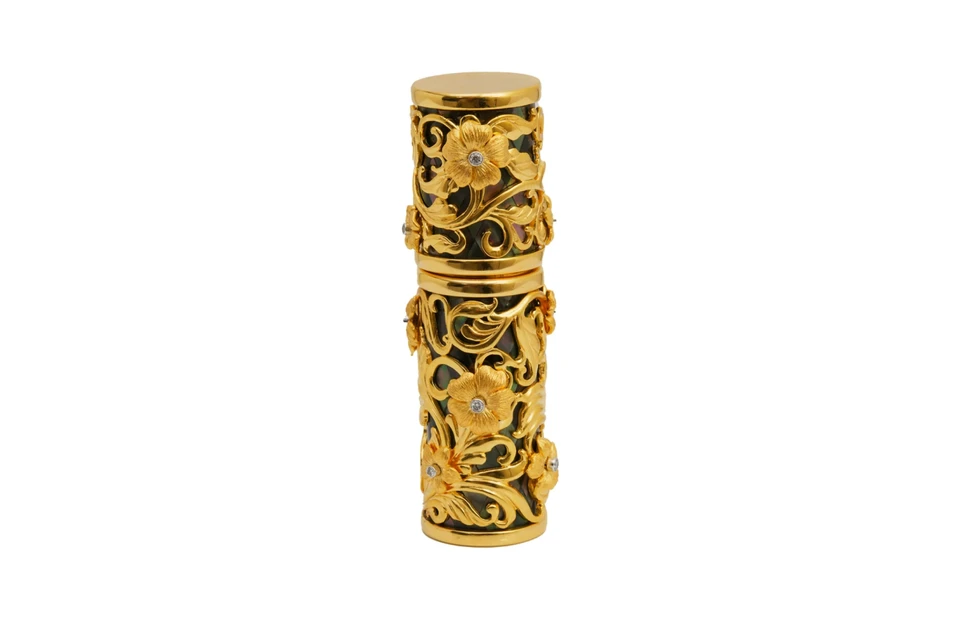 <p>Floral Atomizer by Prologue, with a mosaic base of mother of pearl and semi-precious stones, finished with gold, silver, and handset diamonds</p>
