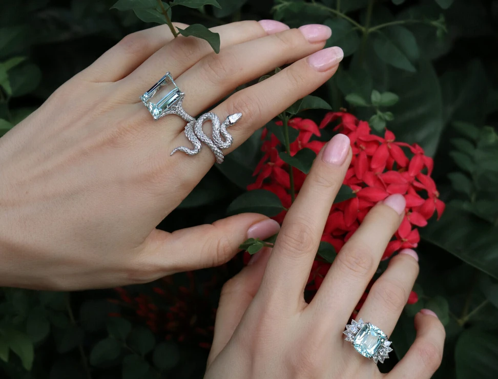 <p>Rings by Valentina Fine Jewellery including (from left to right), a 11.23-carat emerald-cut aquamarine ring with 1.02 carats of diamonds, the Diamond Bamboo Pit Viper Snake ring with 0.57 carats of diamonds, and a 10.22-carat cushion-cut aquamarine ring with 1.57 carats of diamonds, all in 18k white gold </p>
