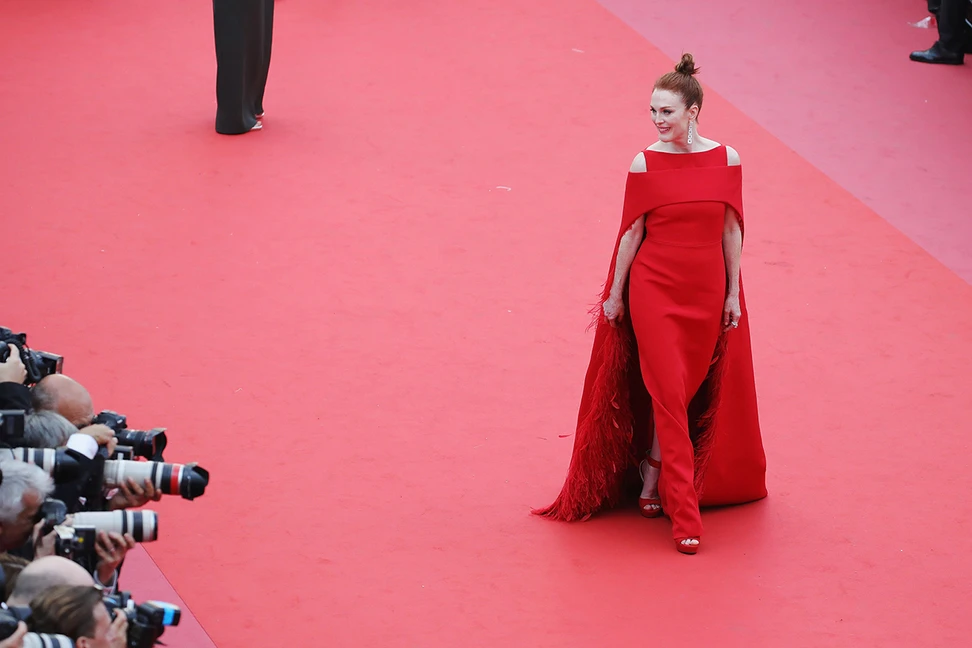 <p>Julianne Moore on the Cannes Film Festival red carpet wearing Givenchy Couture and Chopard diamond drop earrings</p>