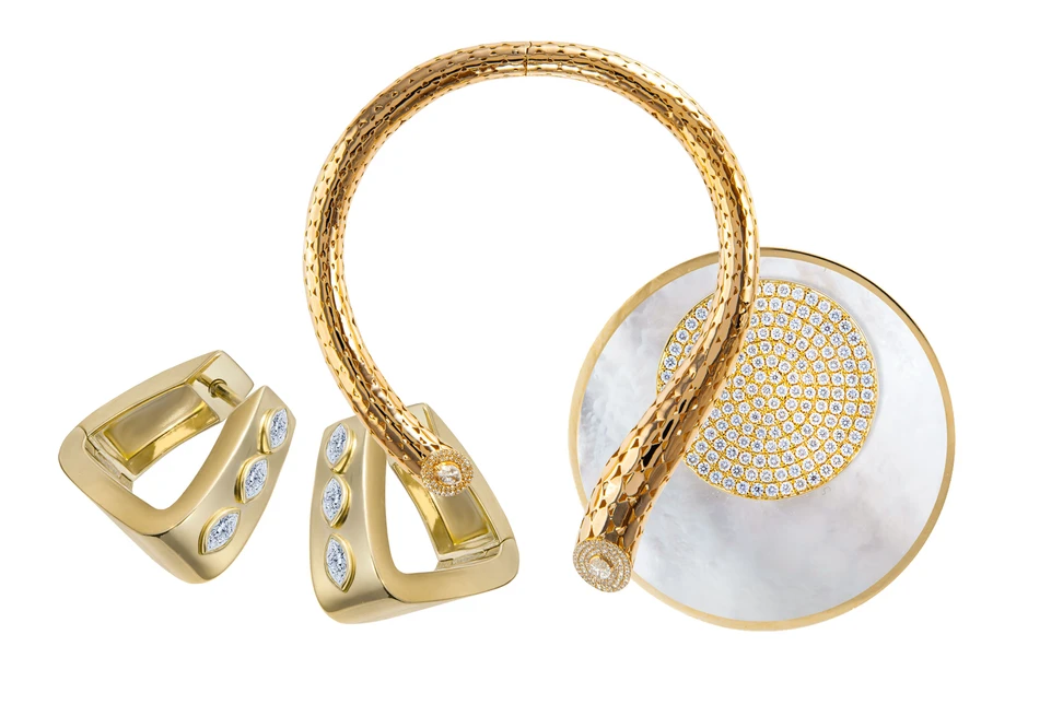 <p>A selection of pieces by Maison H Jewels, including the Tube torque necklace (centre), the Tous Les Jour hoop earrings in 18k yellow gold (left) and the Disc earrings with diamonds and mother of pearl in 18k yellow gold</p>
