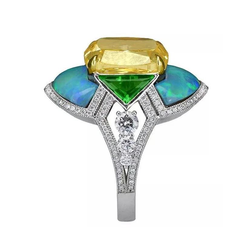 <p>Morelle Davidson ring with a 6.65 cts cushion cut yellow diamond, opals and deep apple green triangular-cut tsavorite garnets</p>