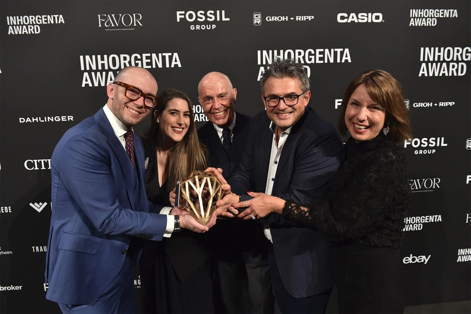 <p>The Serafino Consoli team collects the Inhorgenta Award for High Jewellery of the Year for its multi-sized Grande Bellezza ring</p>