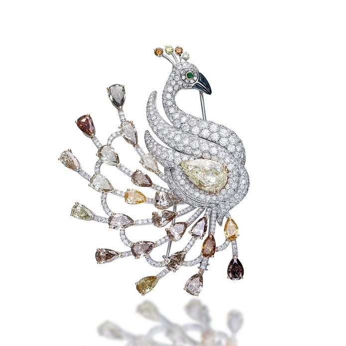 'Pavone Diamanti ' brooch from the 'Exceptional Fauna' collection with  fancy yellow, champagne and colourless diamonds in 18k white gold